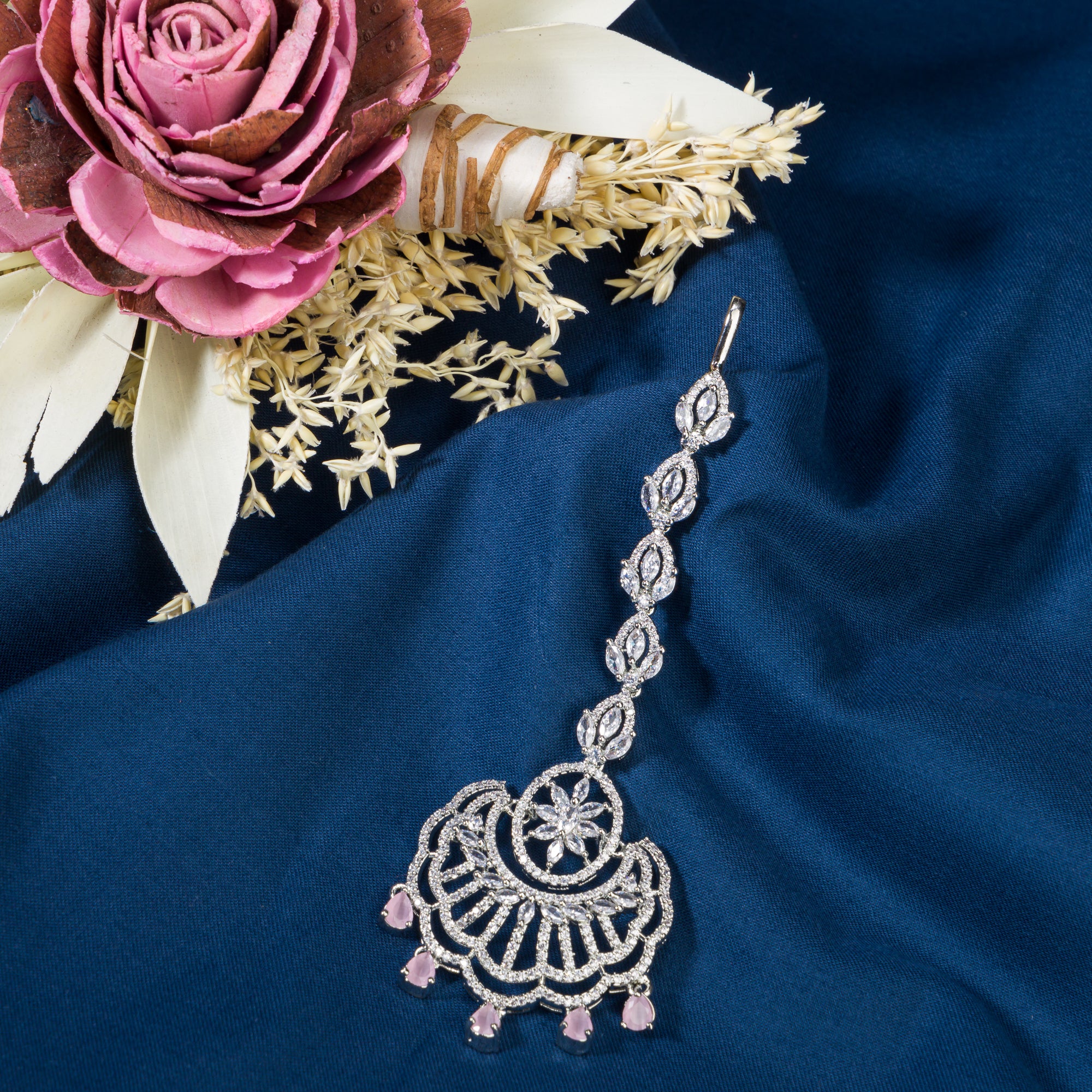 Pink zircon maang tika in silver, perfect for party wear, adding a soft, elegant pop of color to your look