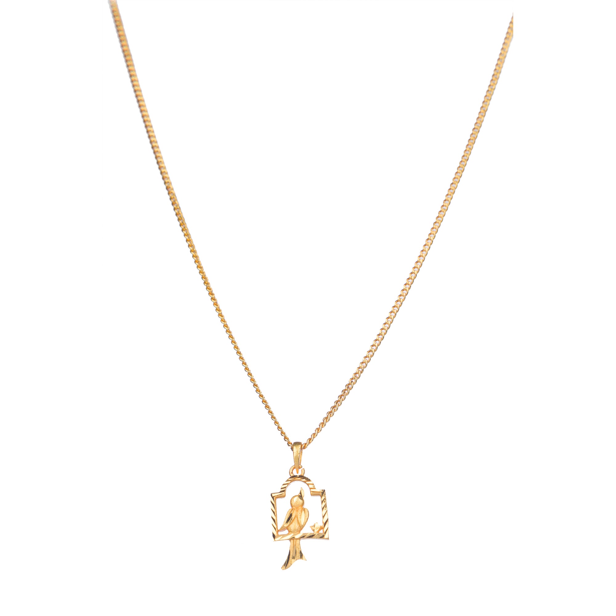 "Charming gold-tone pendant with a bird in a nest, perfect for casual wear, with a warm, elegant finish."