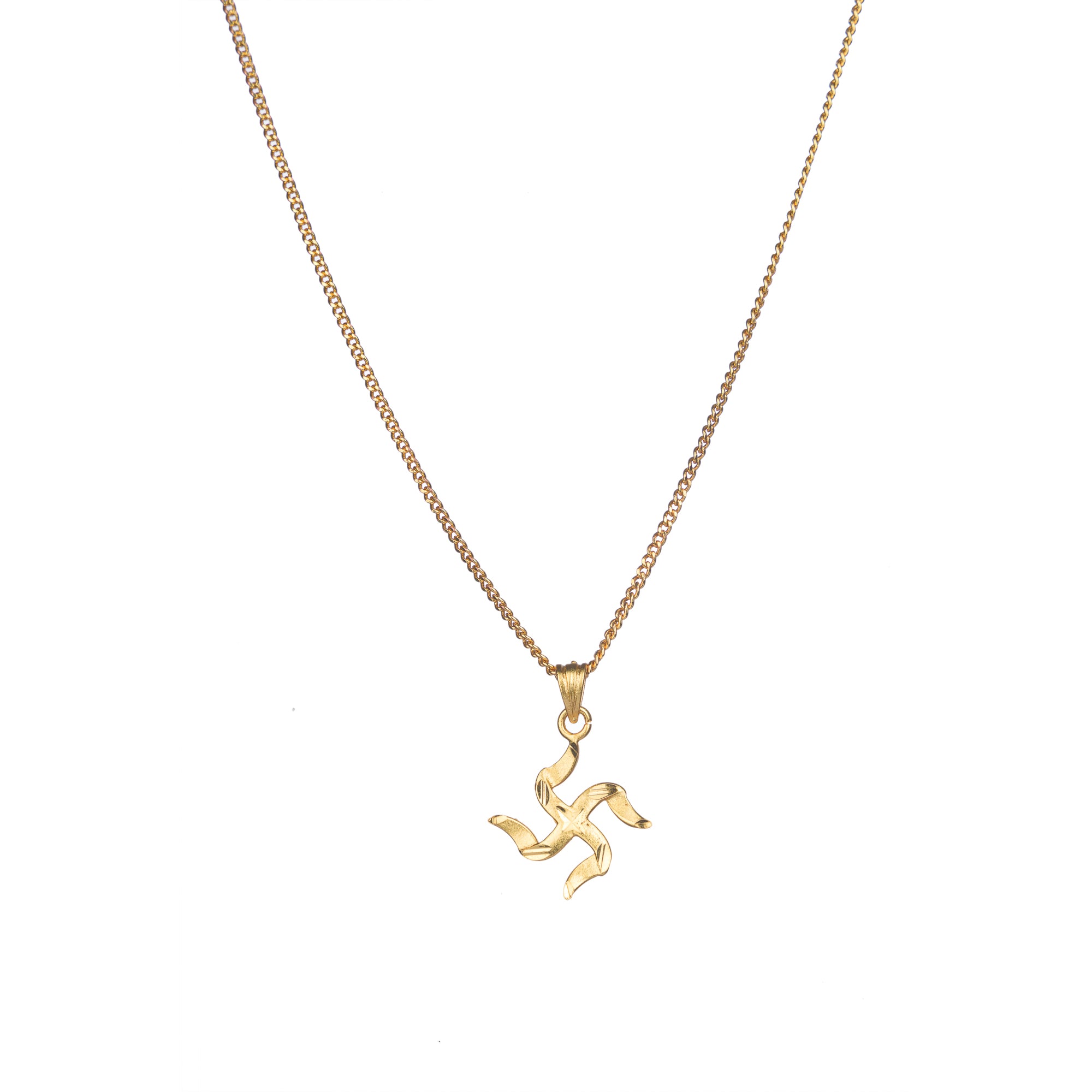 Elegant gold-tone pendant with a Swastik design, perfect for casual wear, adding a meaningful touch."