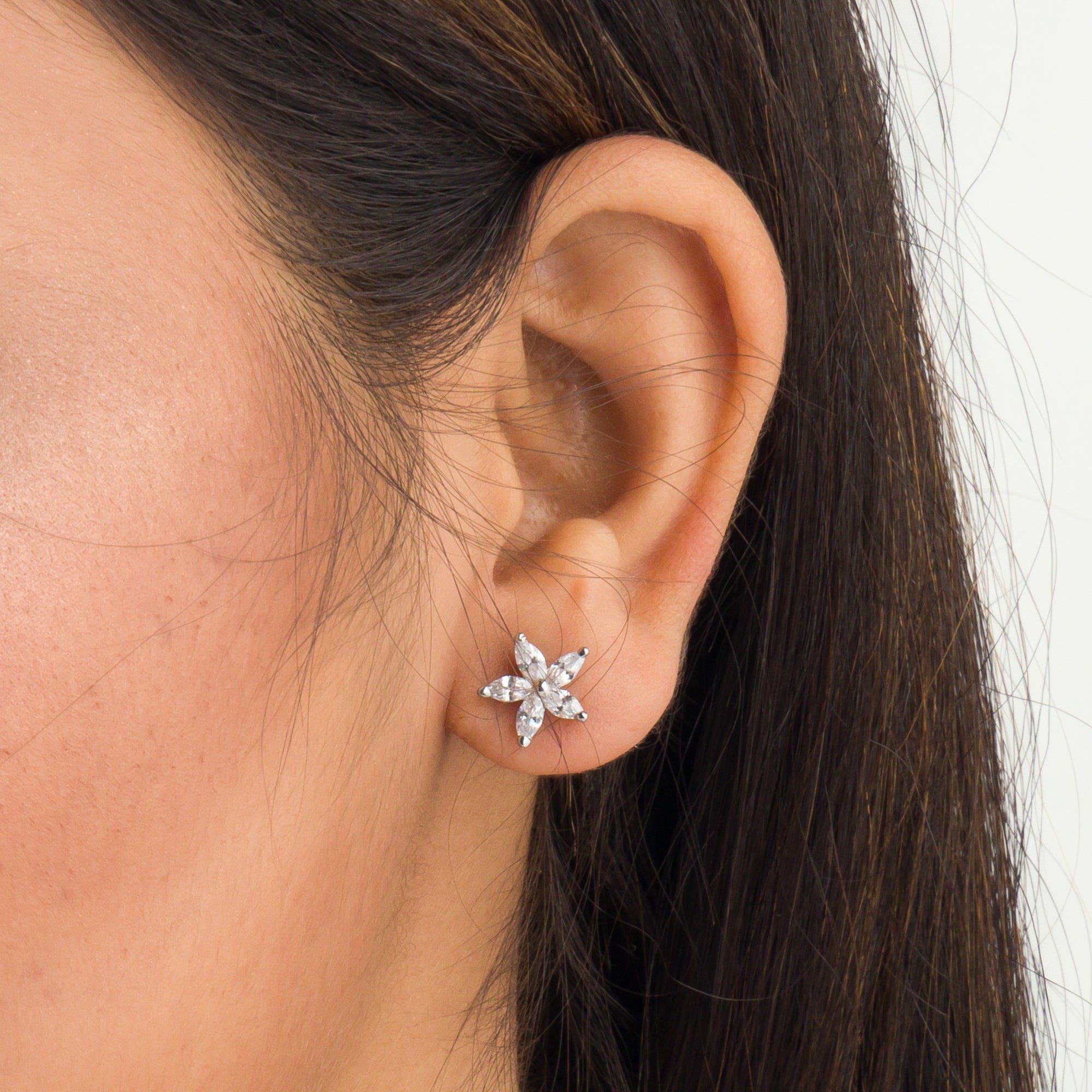 "Star-shaped zircon pendant set for neck and ear, ideal for office wear, adding a modern touch."