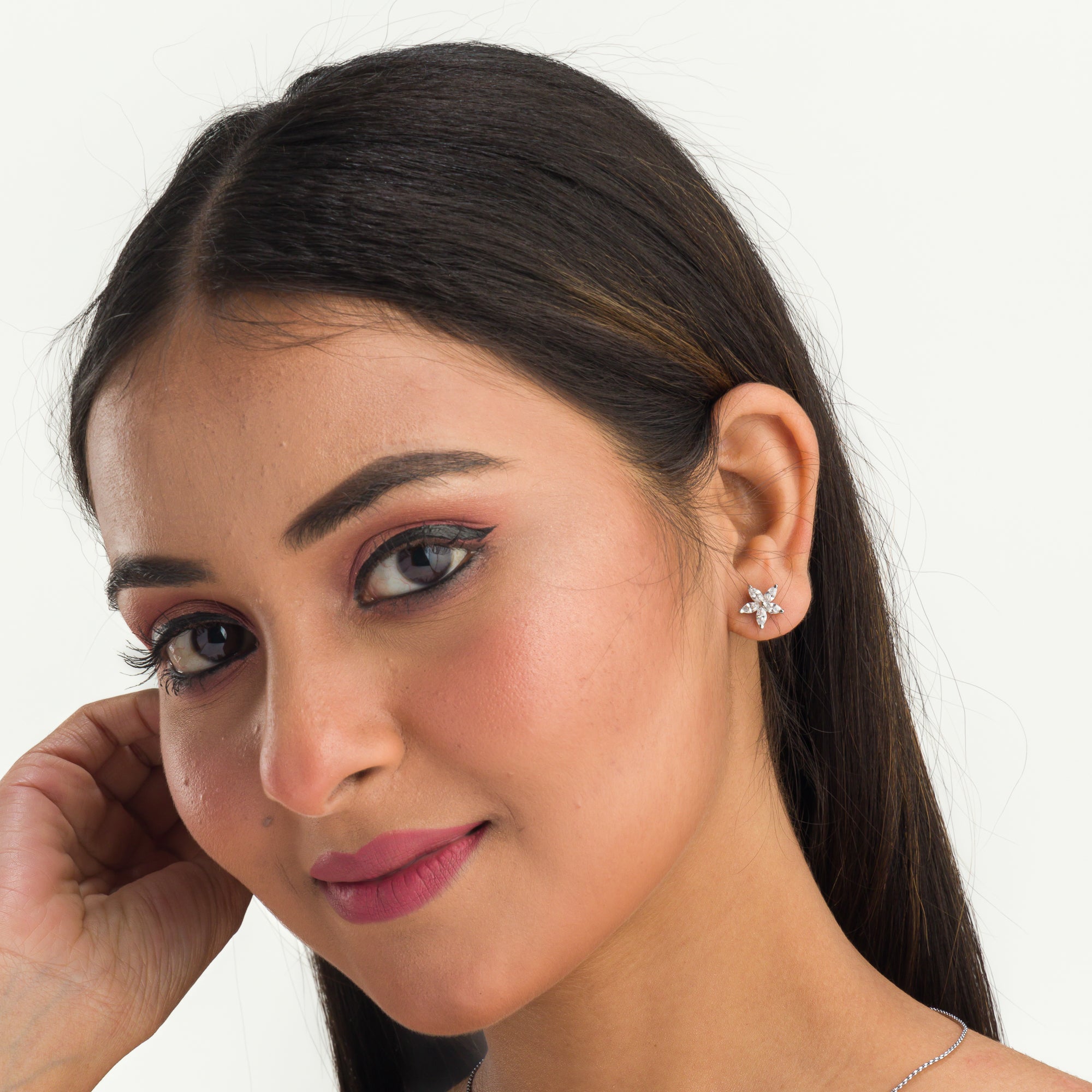 "Star-shaped zircon pendant set for neck and ear, ideal for office wear, adding a modern touch."