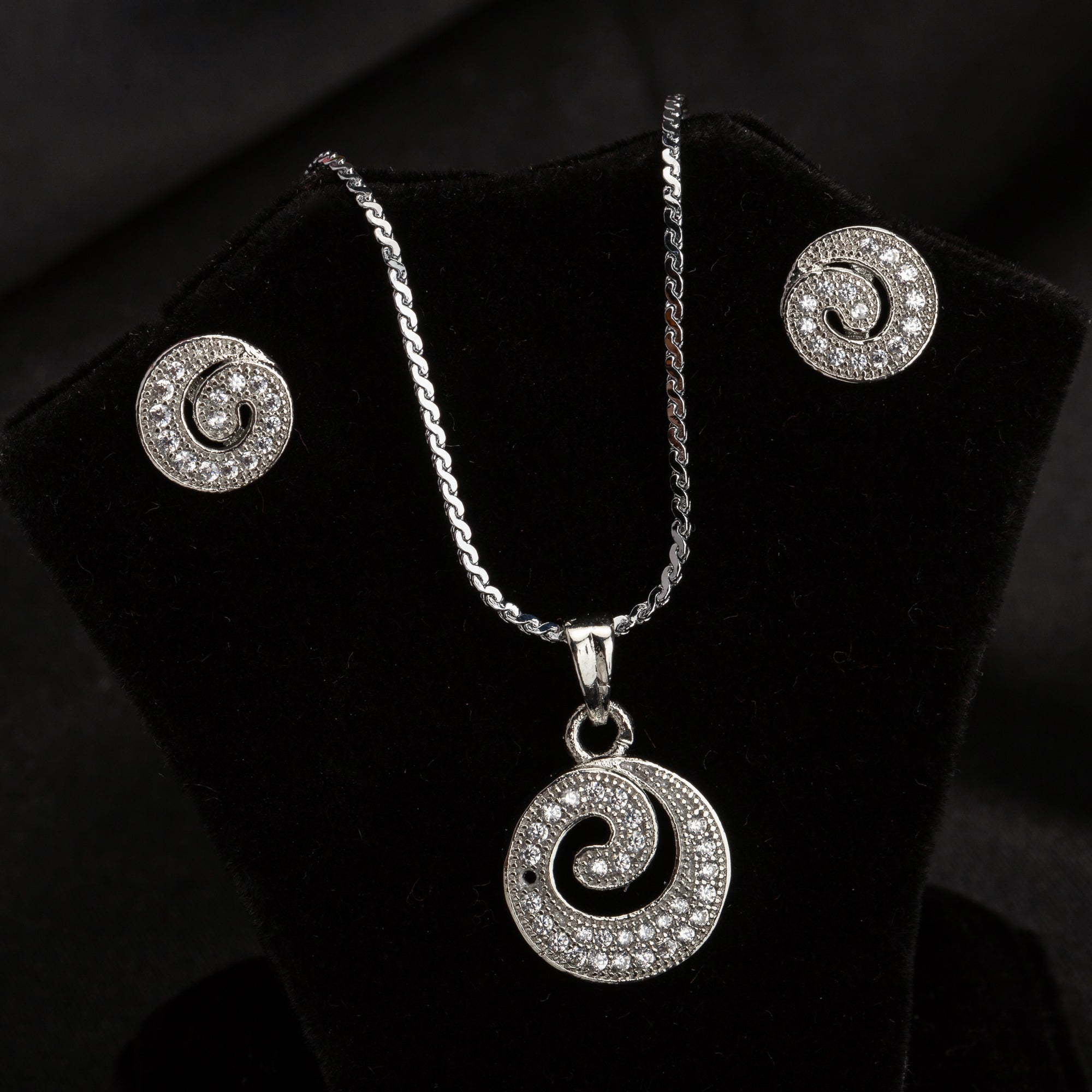 "Rosegold zircon pendant set in round shape, perfect for office wear, adding elegance to your look."