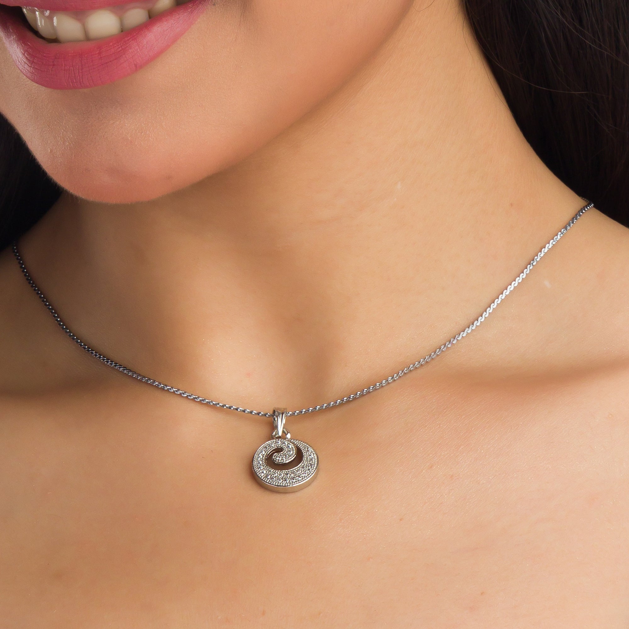 "Rosegold zircon pendant set in round shape, perfect for office wear, adding elegance to your look."