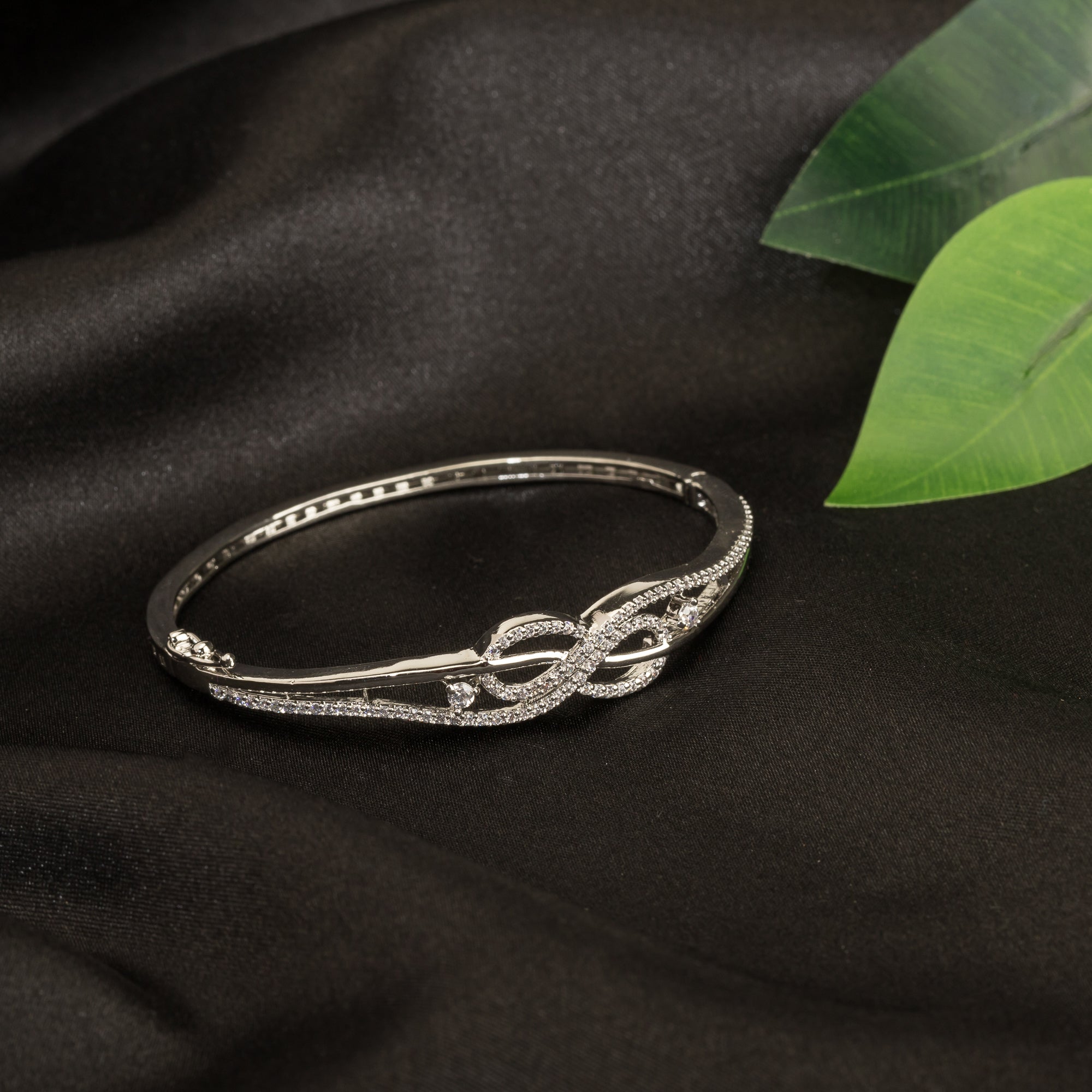 "Elegant zircon infinity bracelet, perfect for party wear, offering a timeless and chic style."
