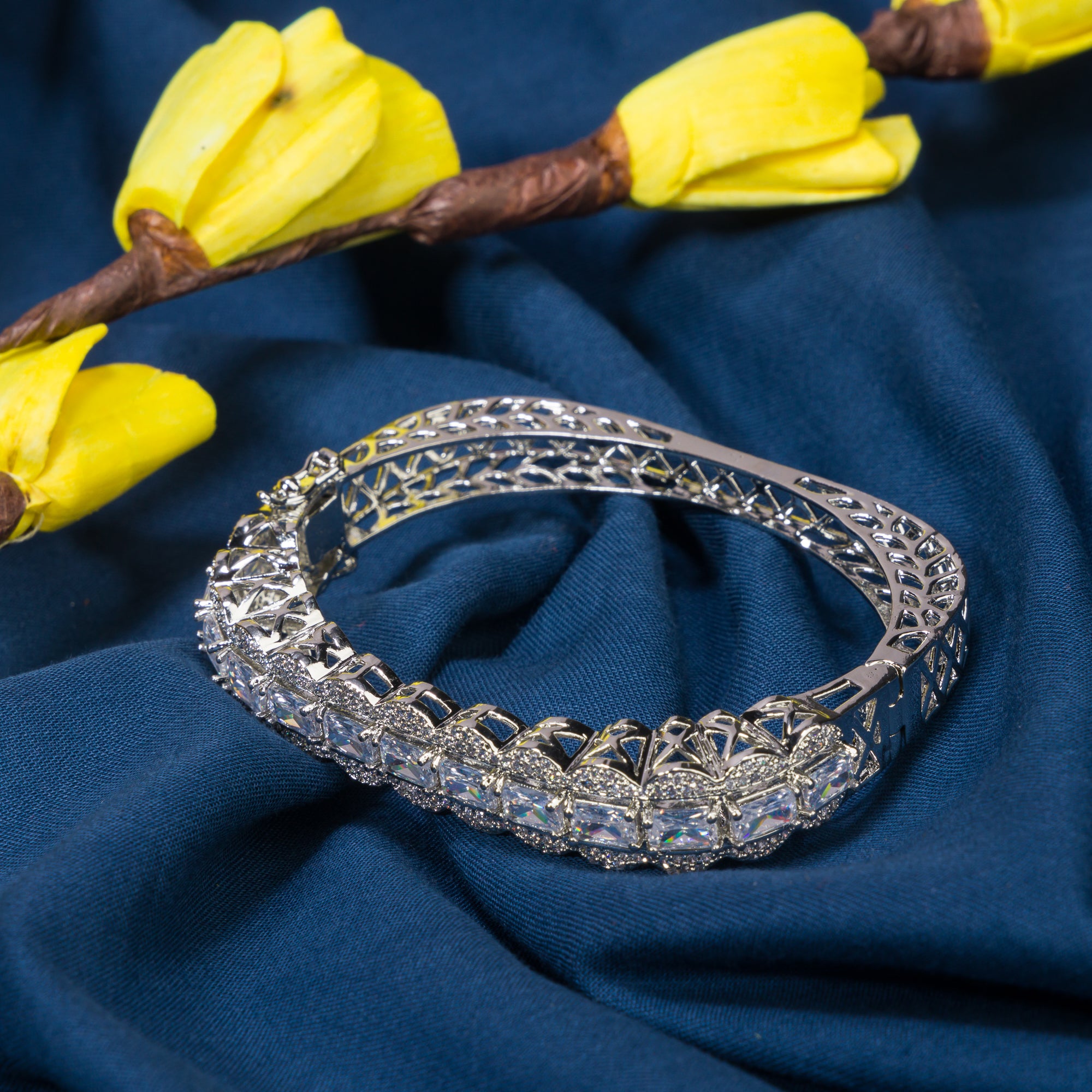Stunning zircon bracelet with studded stones, perfect for party wear, adding elegance and shine."