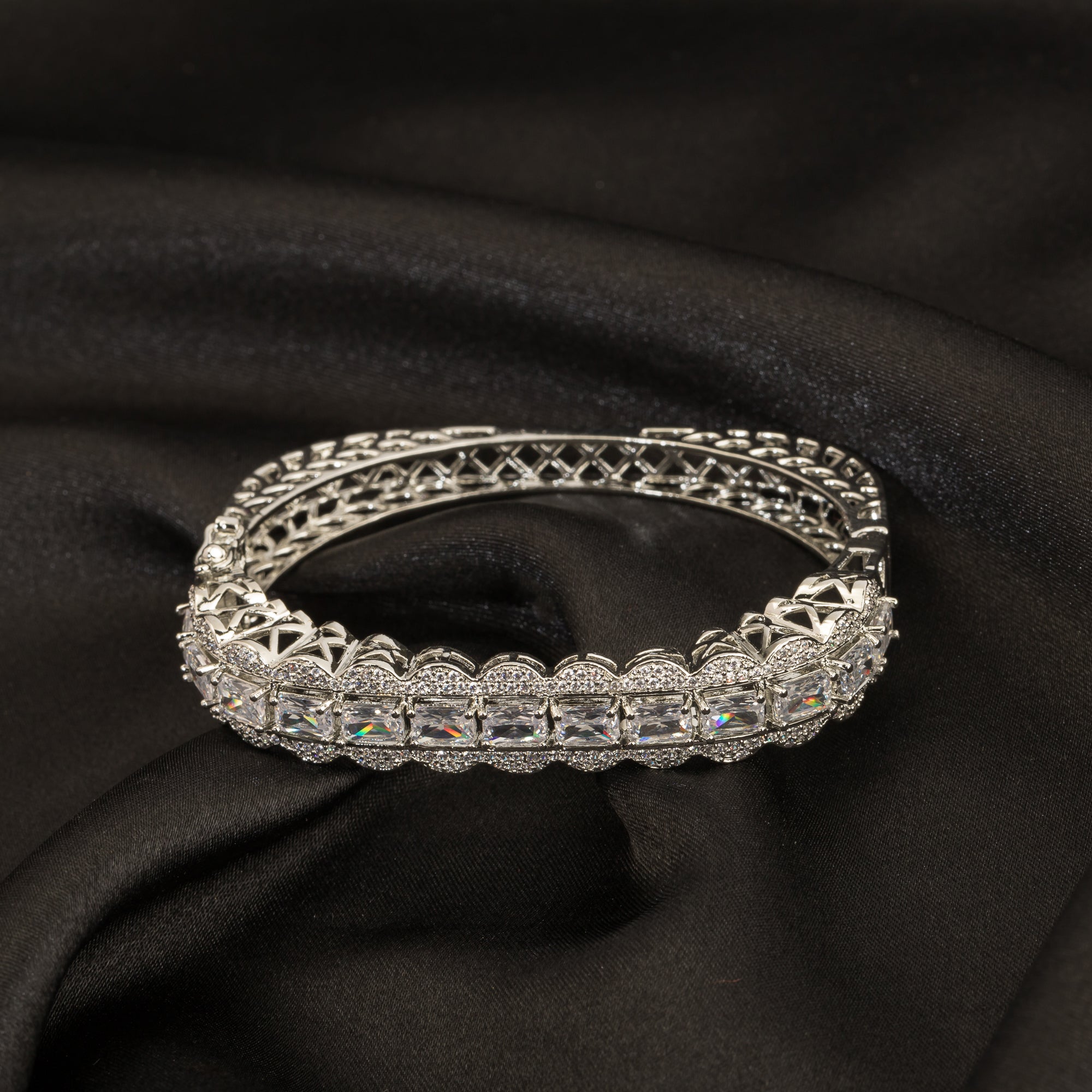 Stunning zircon bracelet with studded stones, perfect for party wear, adding elegance and shine."