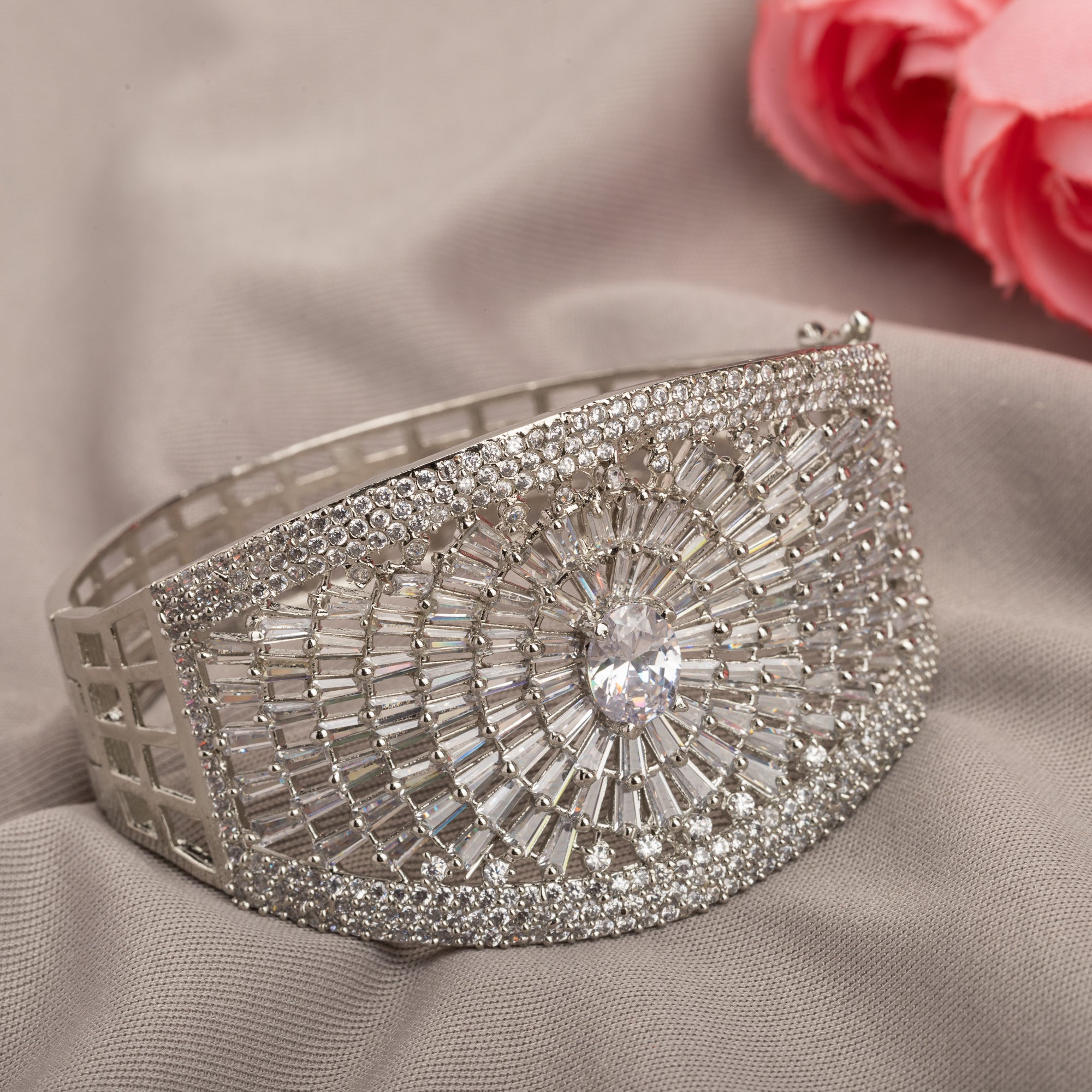 "Elegant zircon bracelet with a single stone surrounded by zircon accents, perfect for party wear."