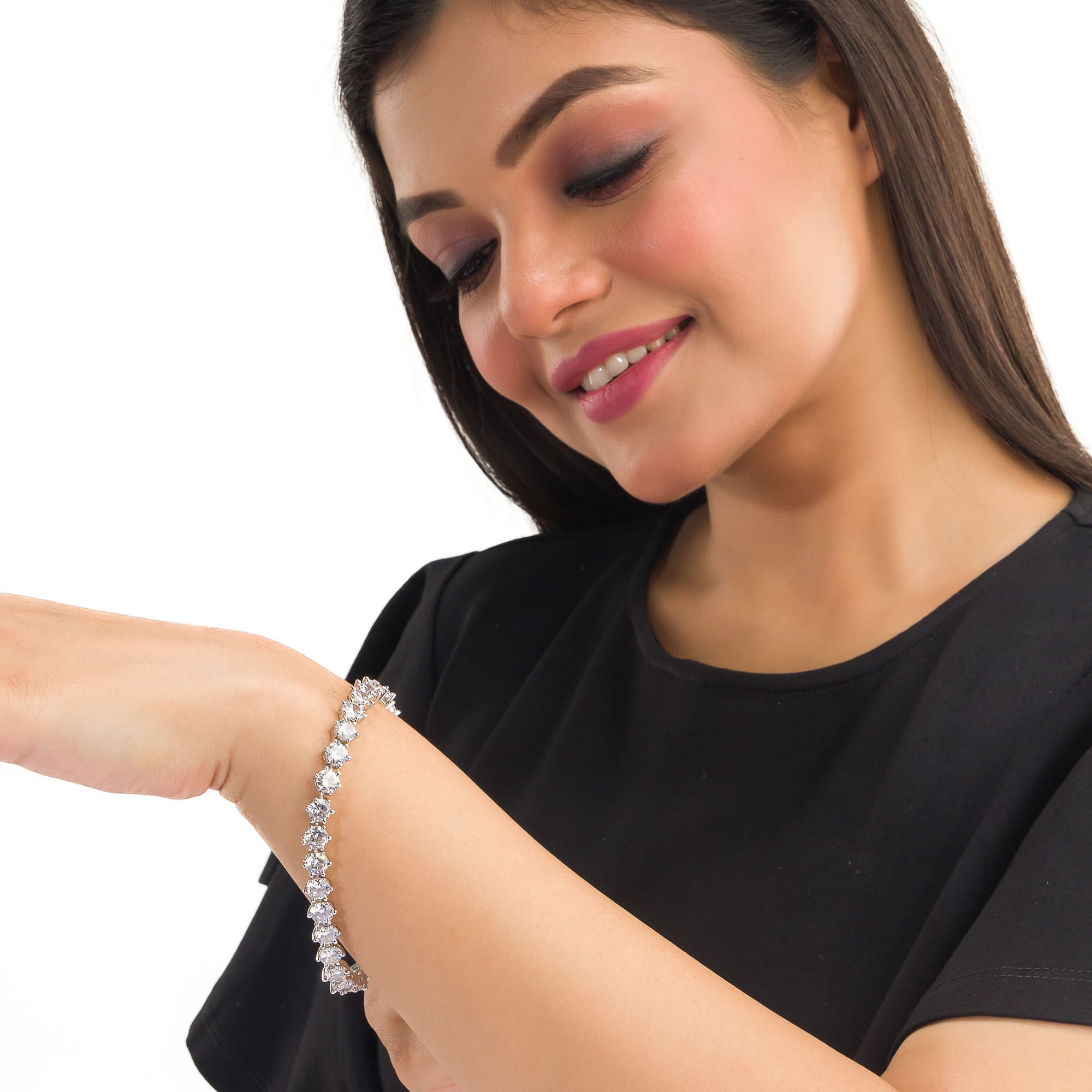 Stunning zircon stone chain bracelet in silver, perfect for party wear, adding sparkle and elegance."