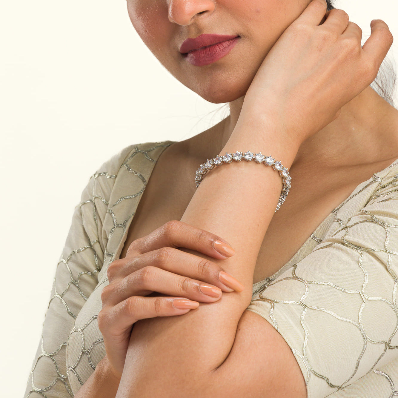 Stunning zircon stone chain bracelet in silver, perfect for party wear, adding sparkle and elegance."