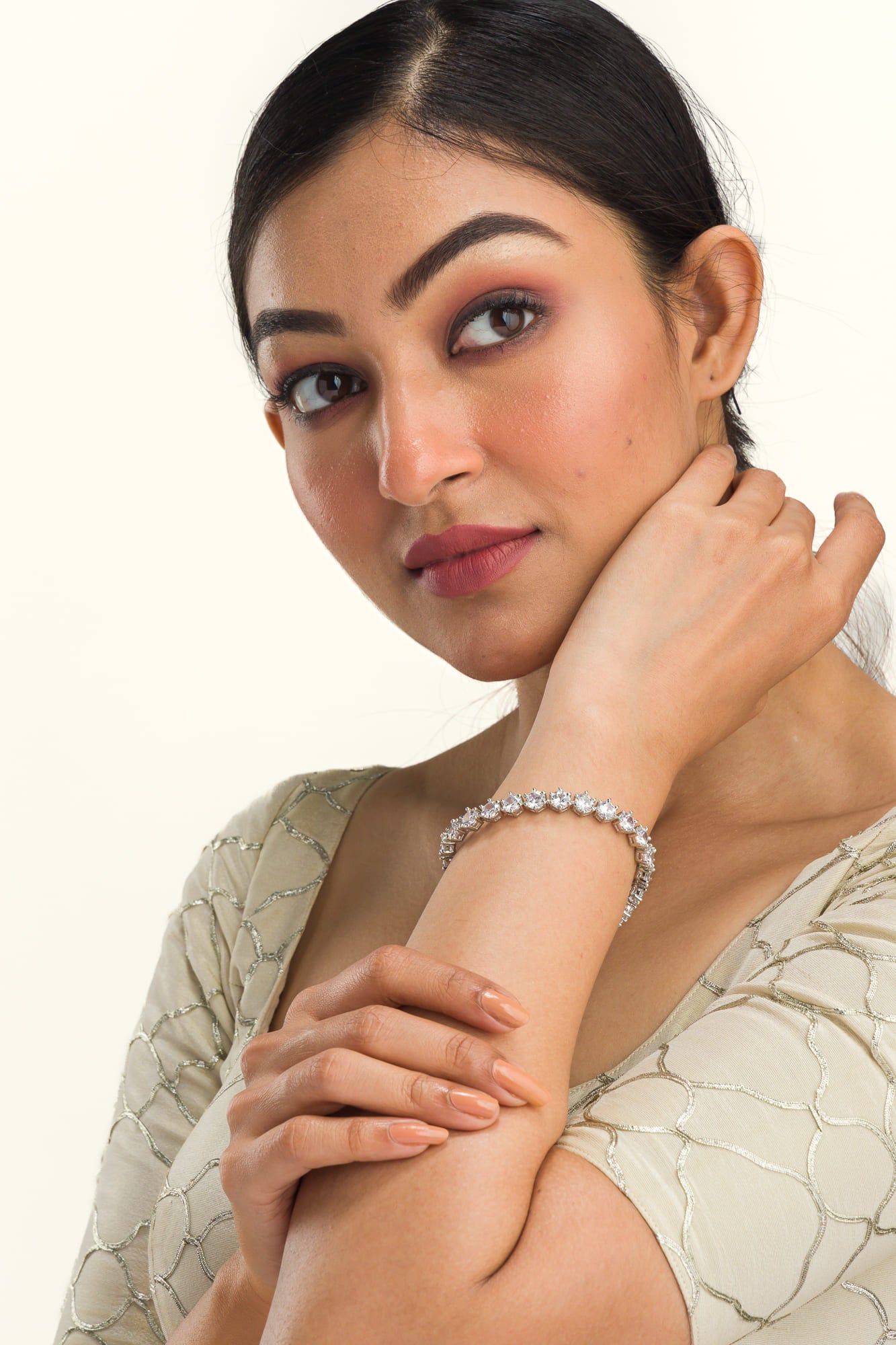 Stunning zircon stone chain bracelet in silver, perfect for party wear, adding sparkle and elegance."