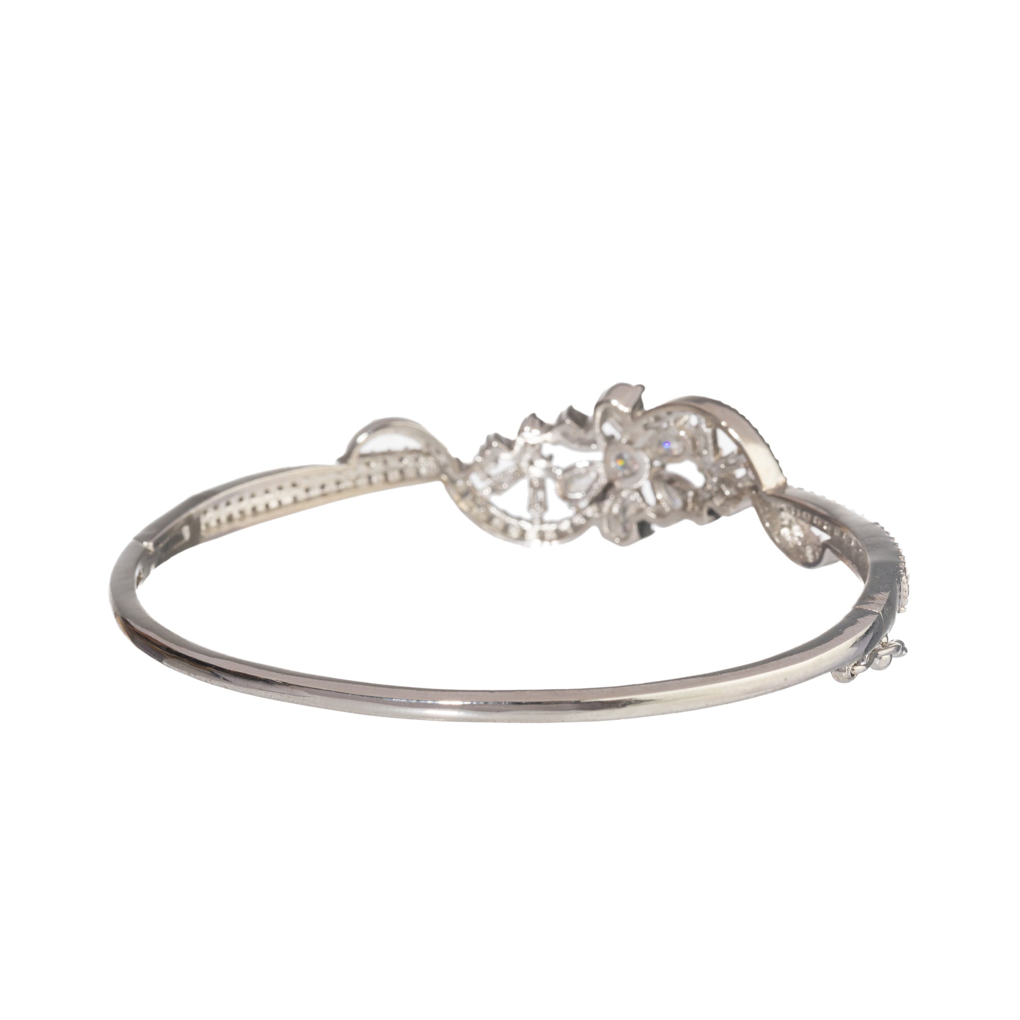 "Brilliant zircon bracelet in silver, showcasing dazzling clarity and gem-like radiance, ideal for party wear."