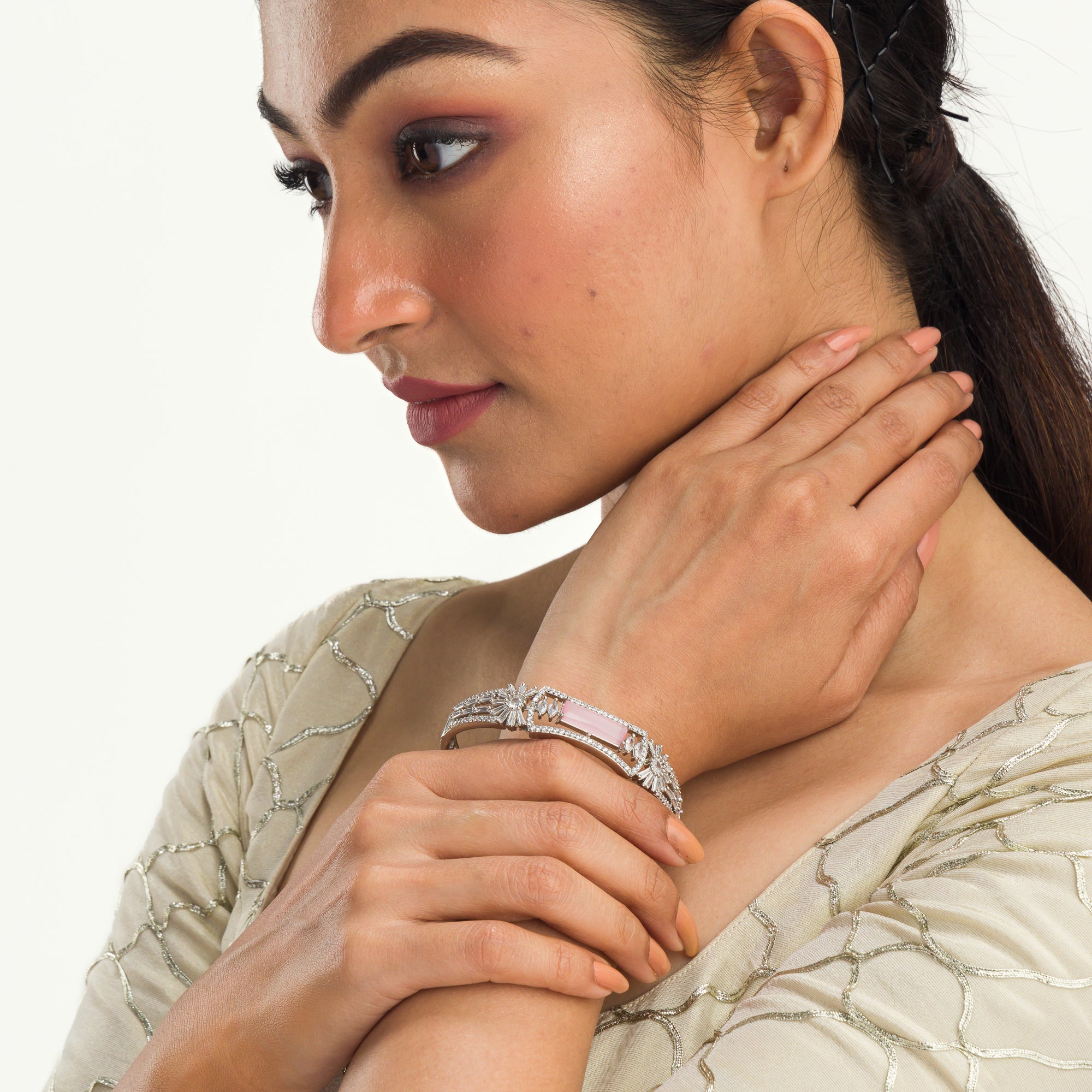 "Sparkling zircon bracelet in silver, radiating dazzling, gem-like brilliance, perfect for party wear."