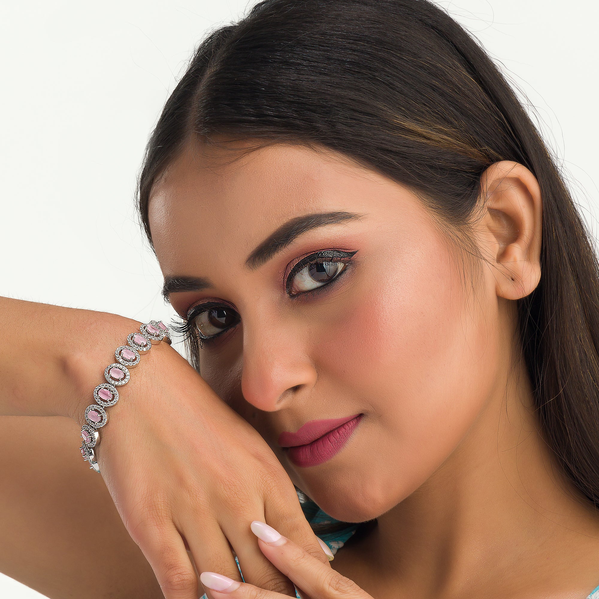 "Delicate pink zircon bracelet in silver, exuding vibrant charm with its soft, rosy glow for party wear."