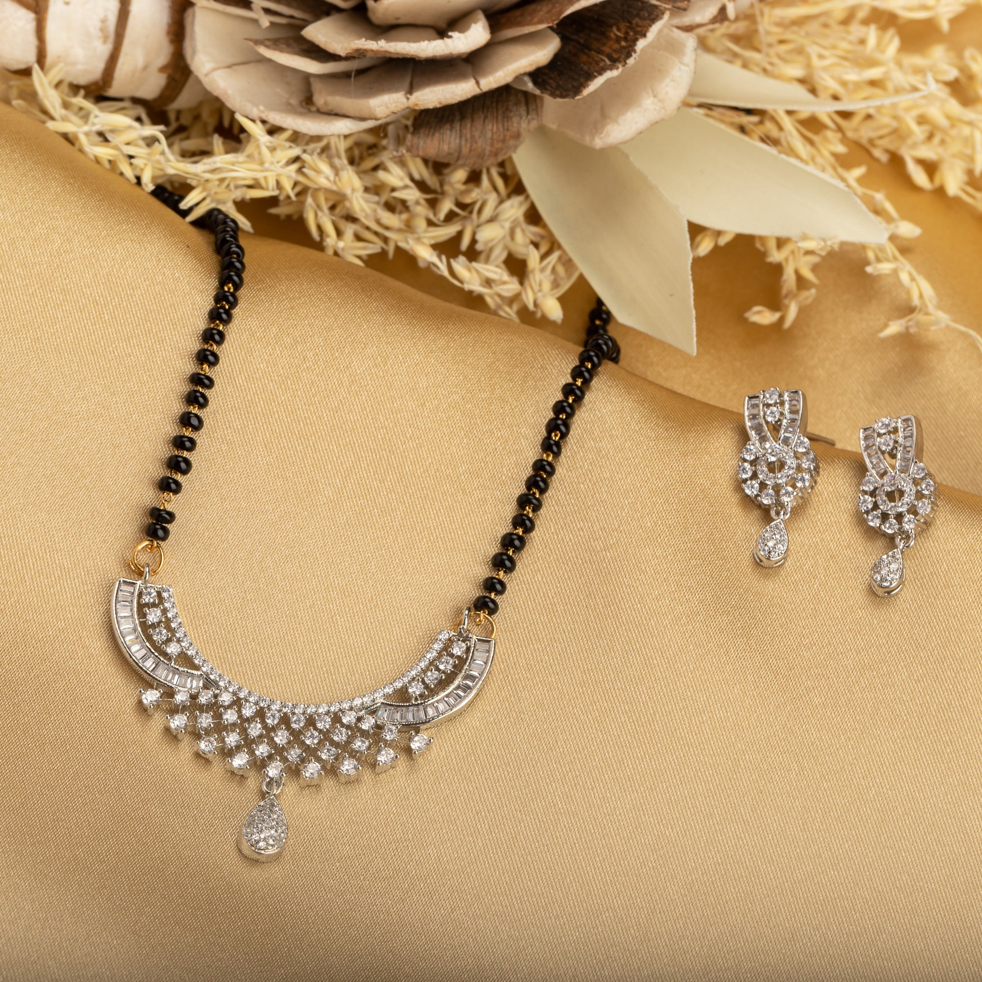 Elegant zircon mangalsutra in black and gold, blending traditional elegance with dazzling sparkle."