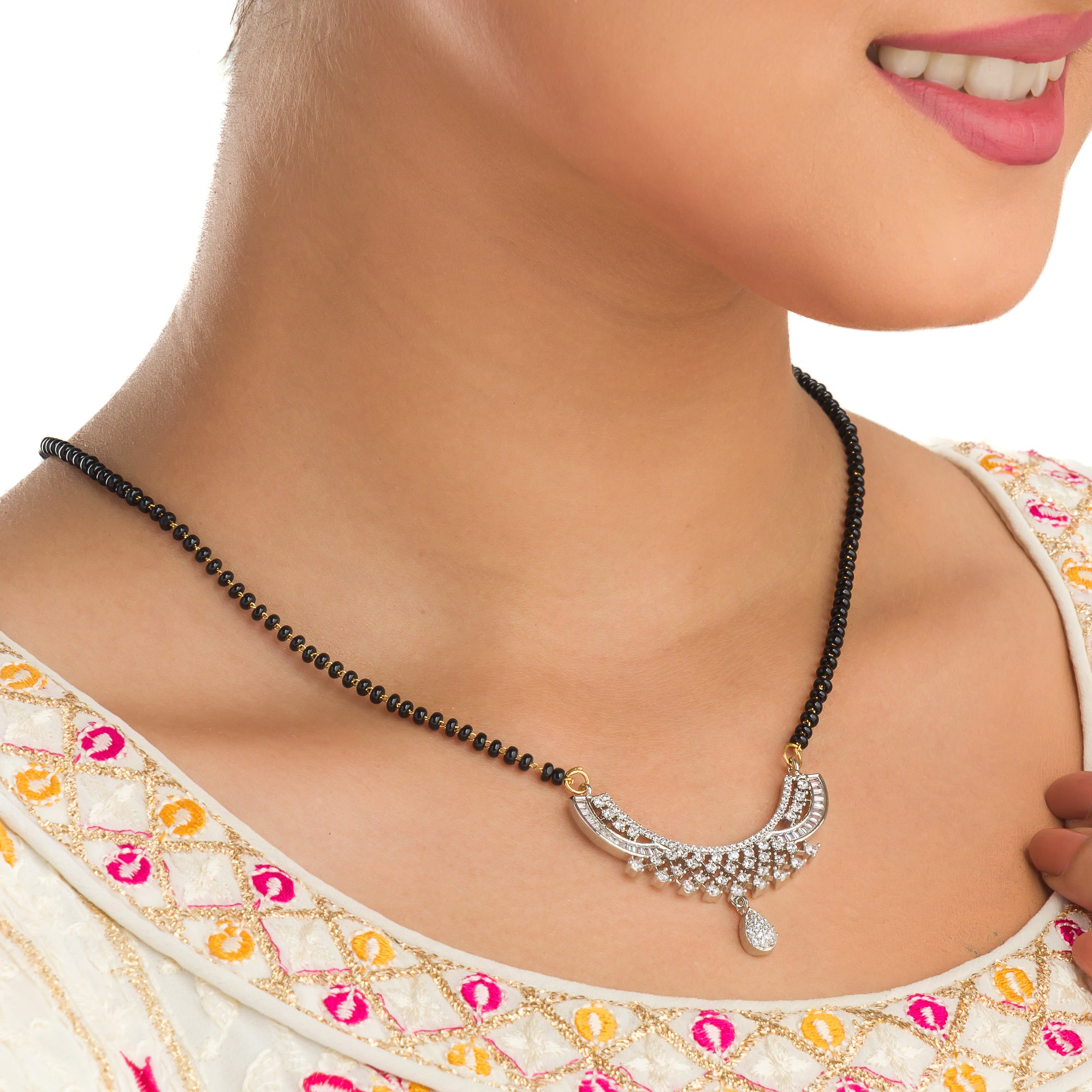 Elegant zircon mangalsutra in black and gold, blending traditional elegance with dazzling sparkle."