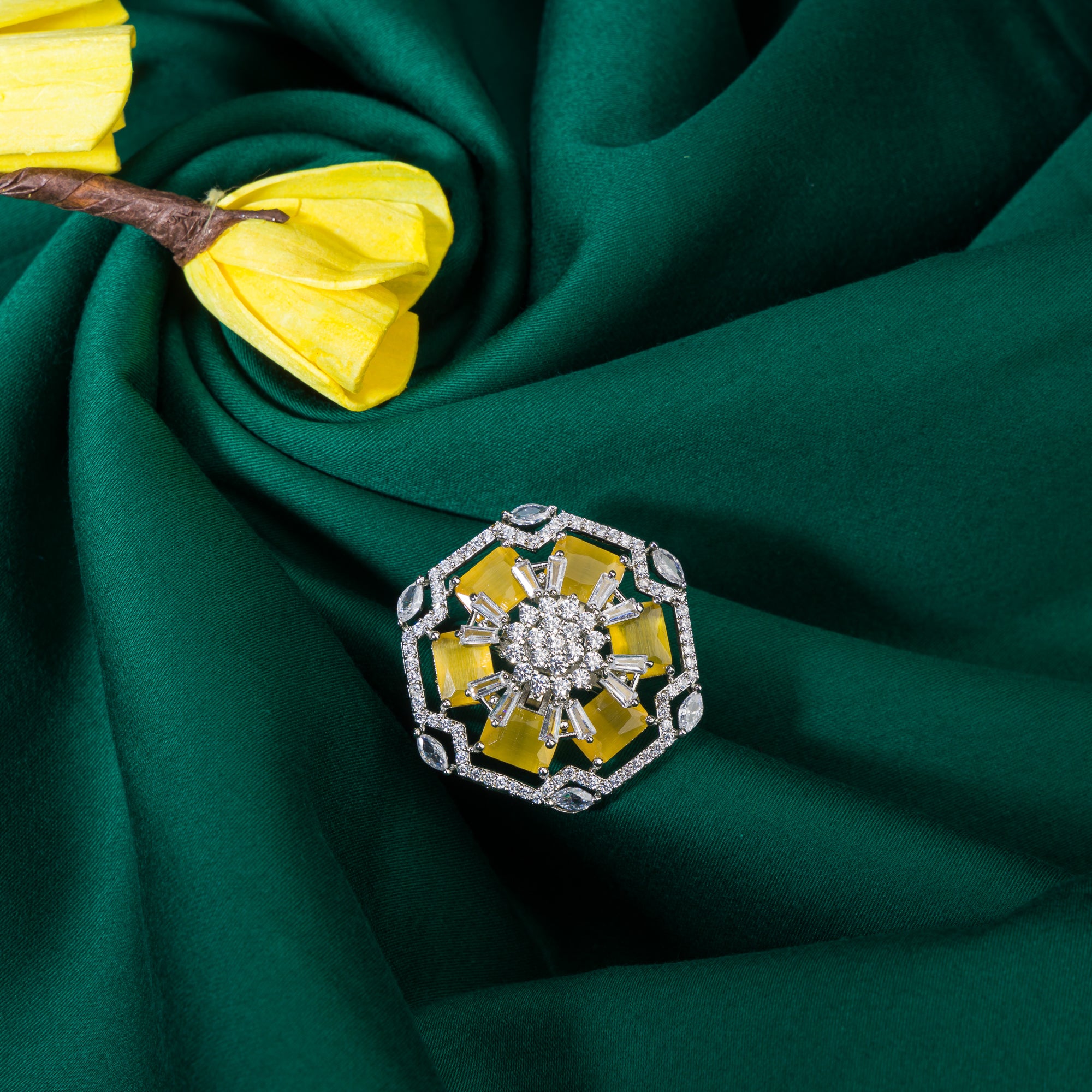 "Yellow zircon finger ring in silver radiates vibrant, eye-catching brilliance for party wear.