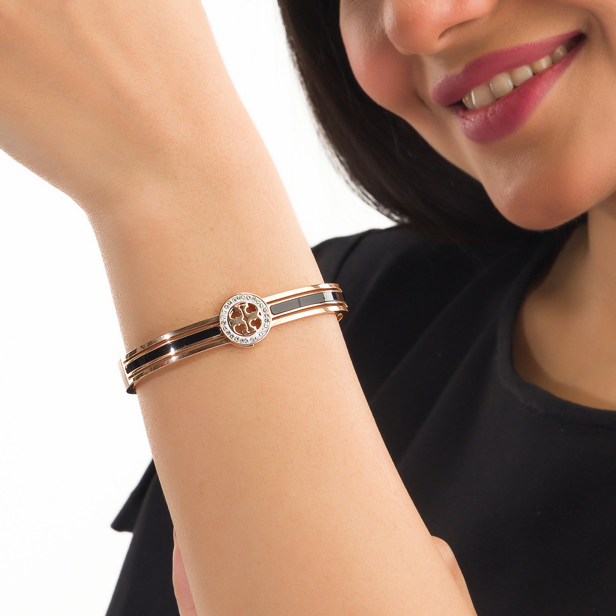 "Zircon bracelet with rose gold polish offers a sophisticated blend of sparkle and warmth for casual wear."