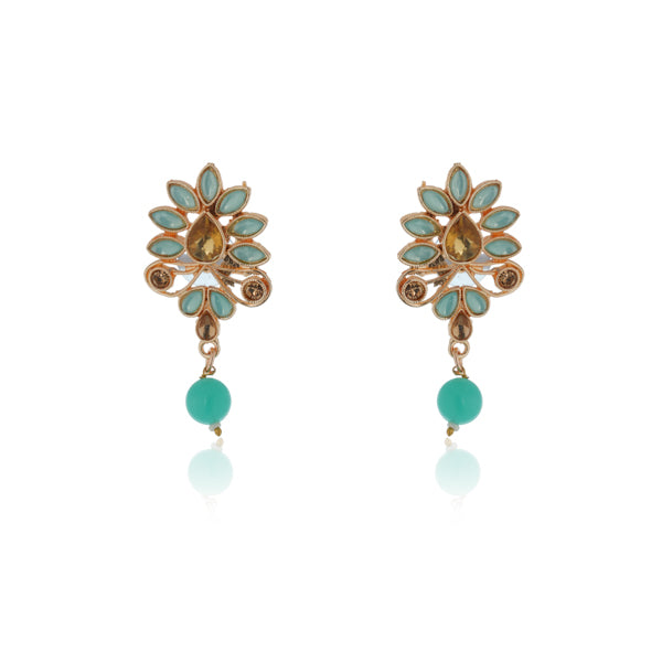 "Zircon stud earrings in silver offer intricate detailing and radiant sparkle for a traditional, elegant party wear look."