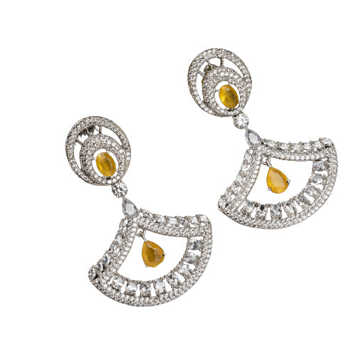 1. Yellow zircon earrings paired with clear zircon create a dazzling contrast of vibrant and sparkling brilliance for party wear.