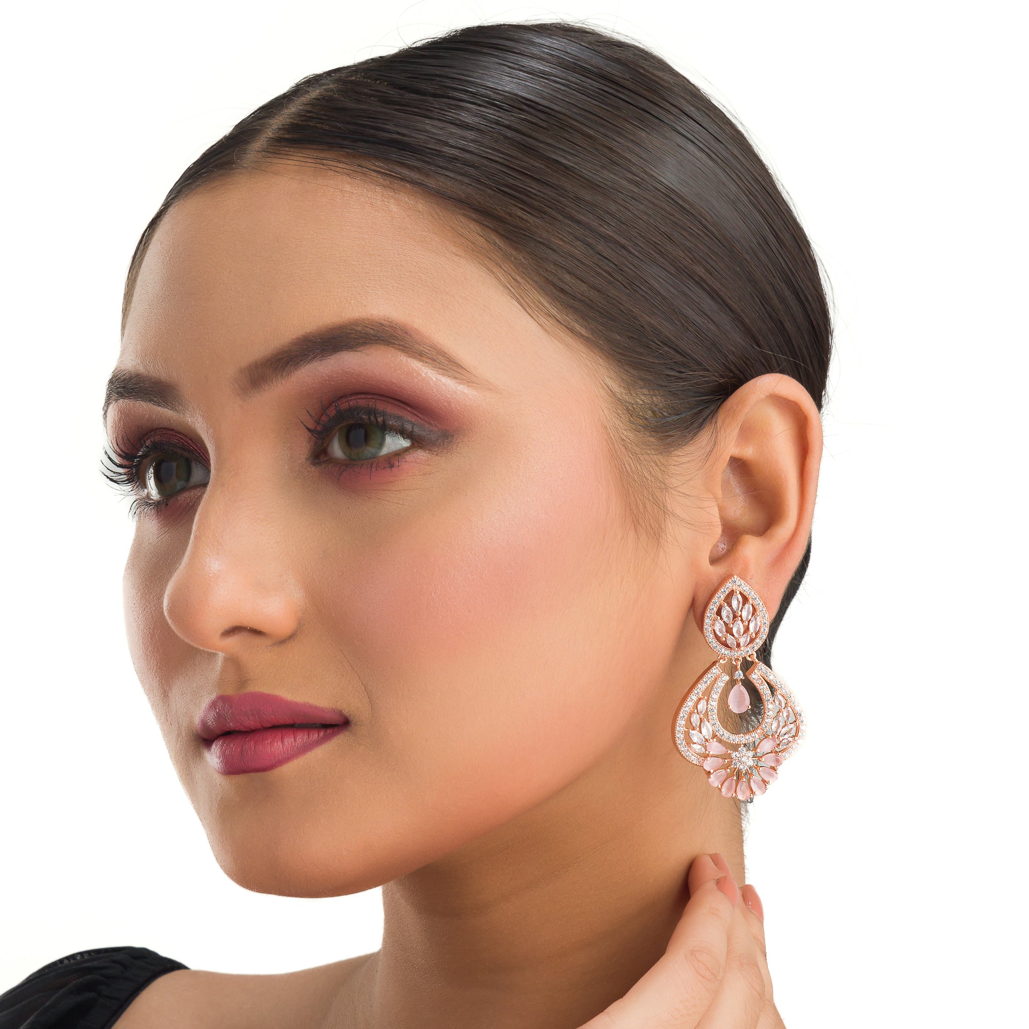 "Orchid zircon earrings with rose gold polish exude romantic elegance and a lush glow."