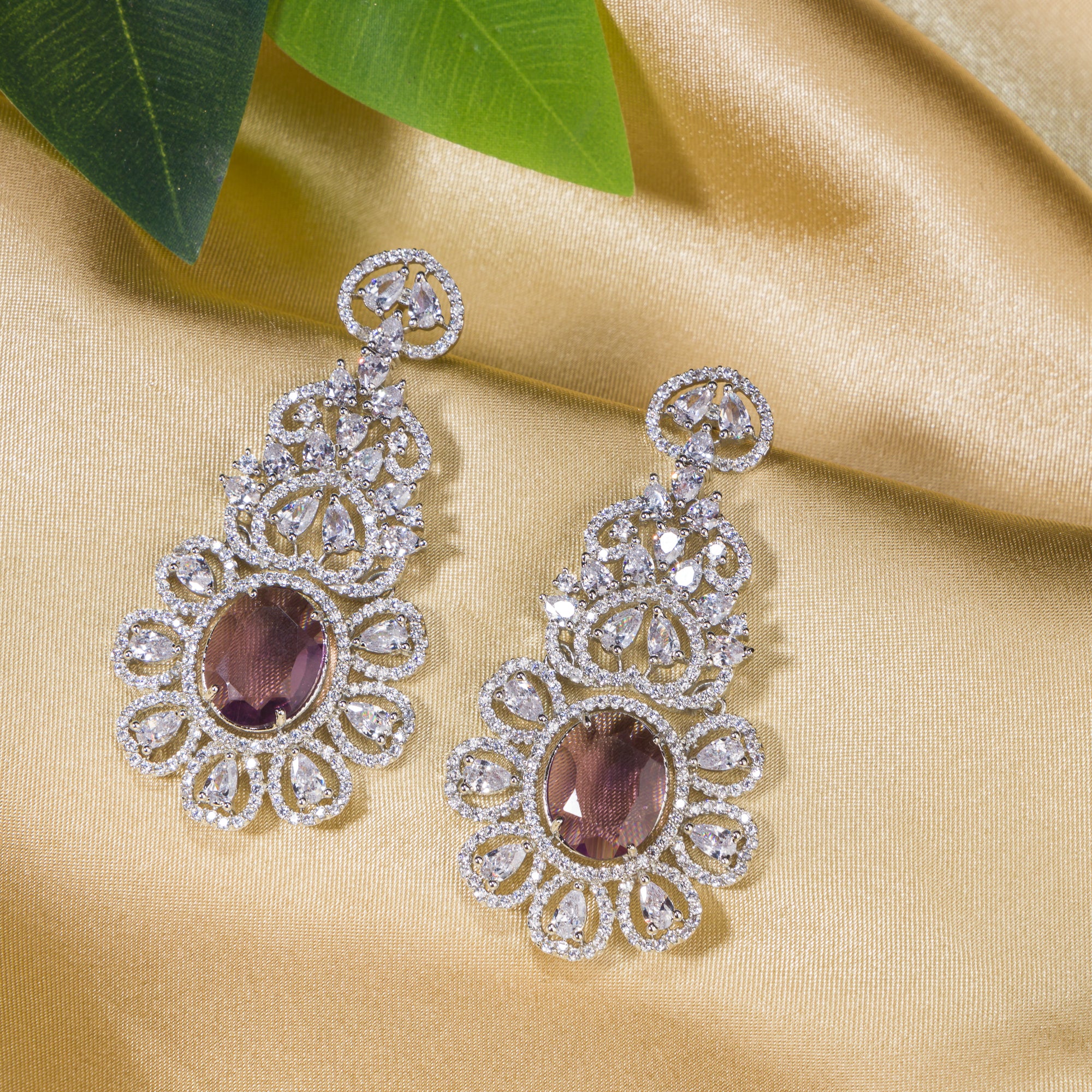 1. "Trendy purple zircon long earrings combine modern chic with sparkling elegance."