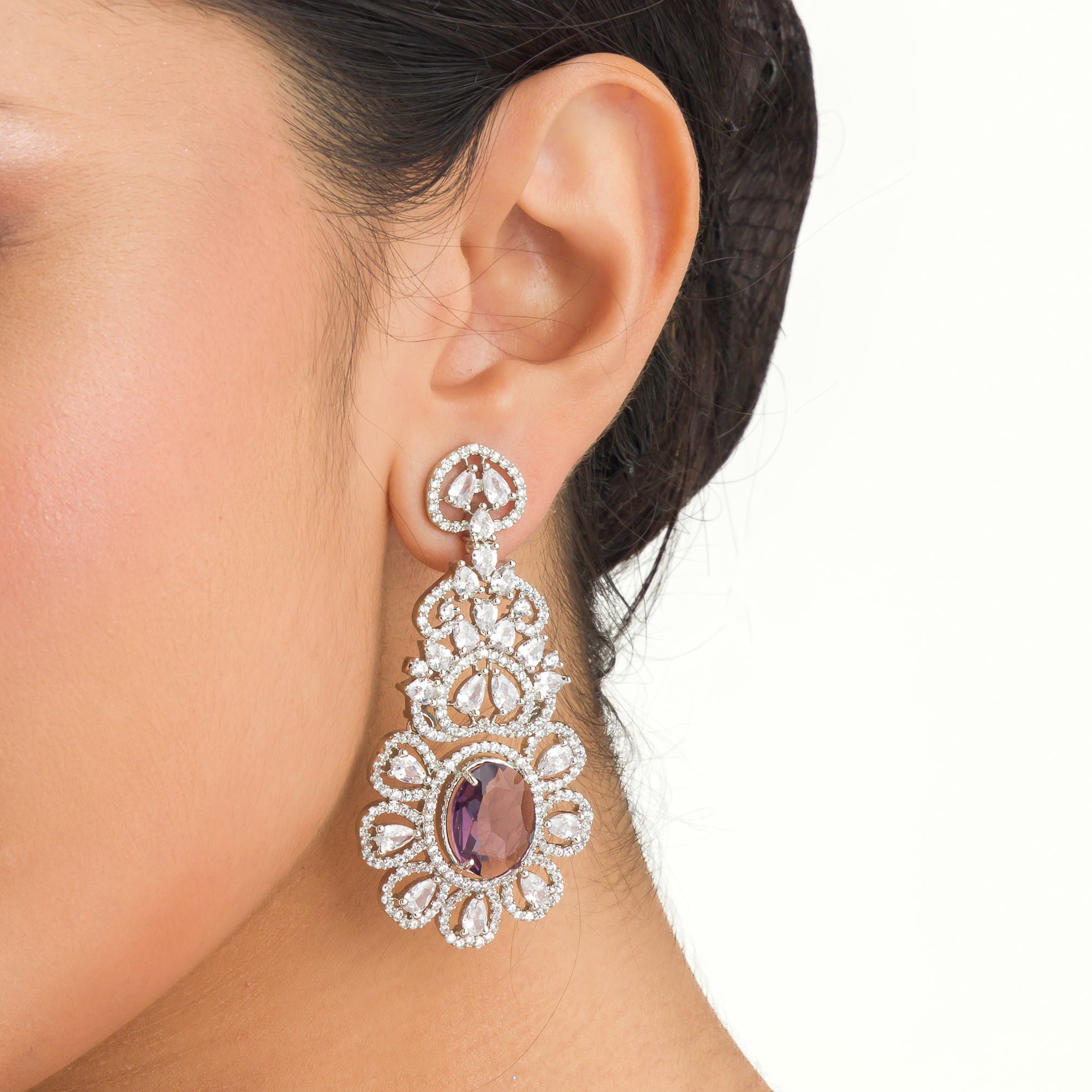 1. "Trendy purple zircon long earrings combine modern chic with sparkling elegance."