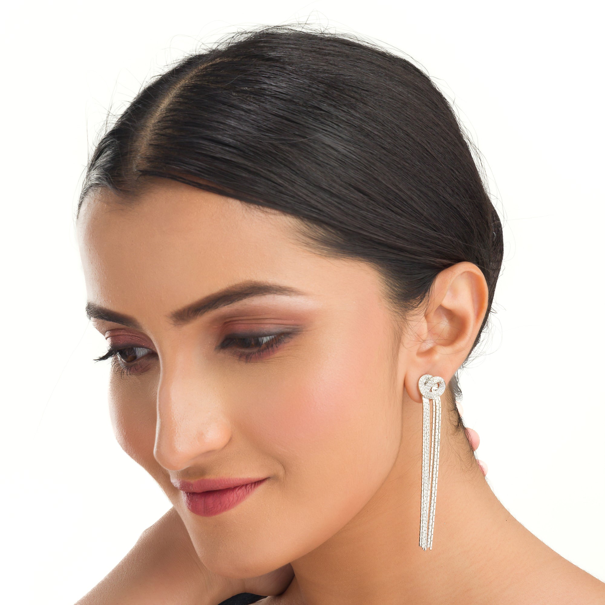 "Trendy zircon and stainless steel long earrings combine modern chic with sparkling elegance."