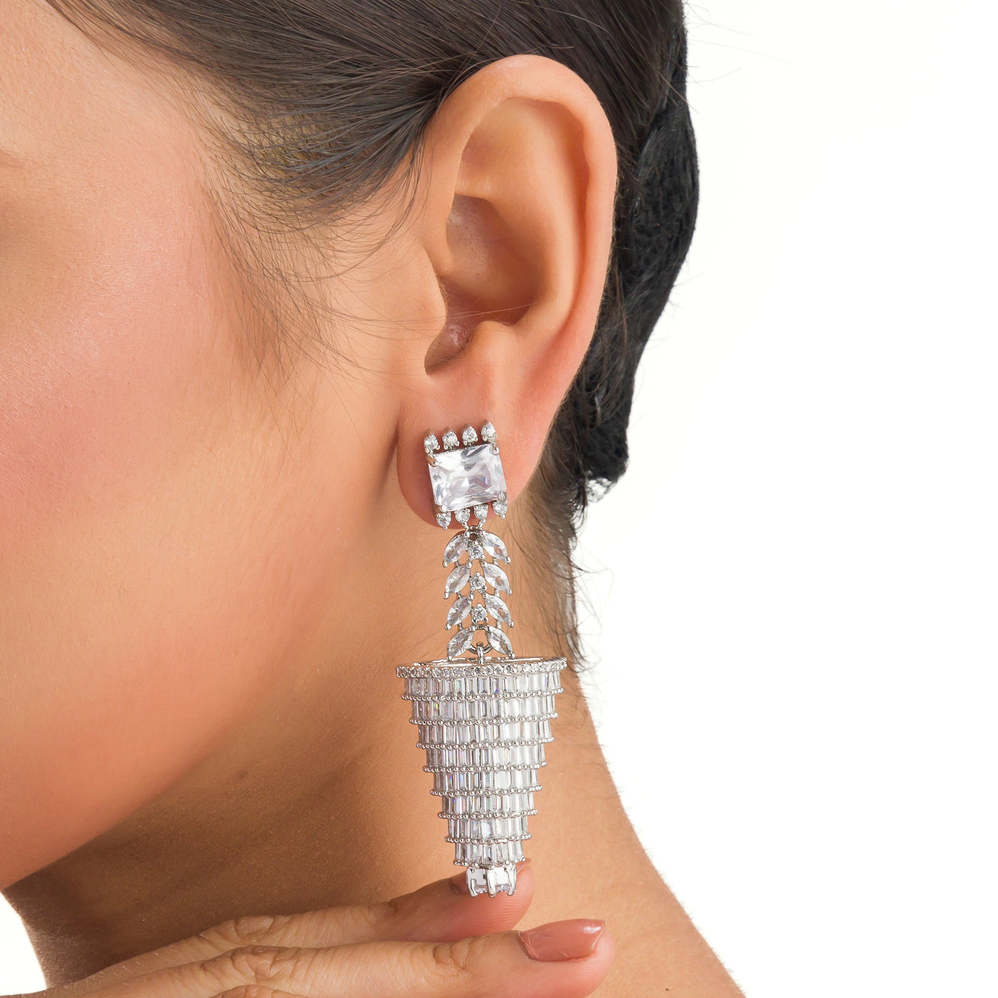 "Graceful long zircon earrings shimmer with timeless sophistication and dazzling elegance."