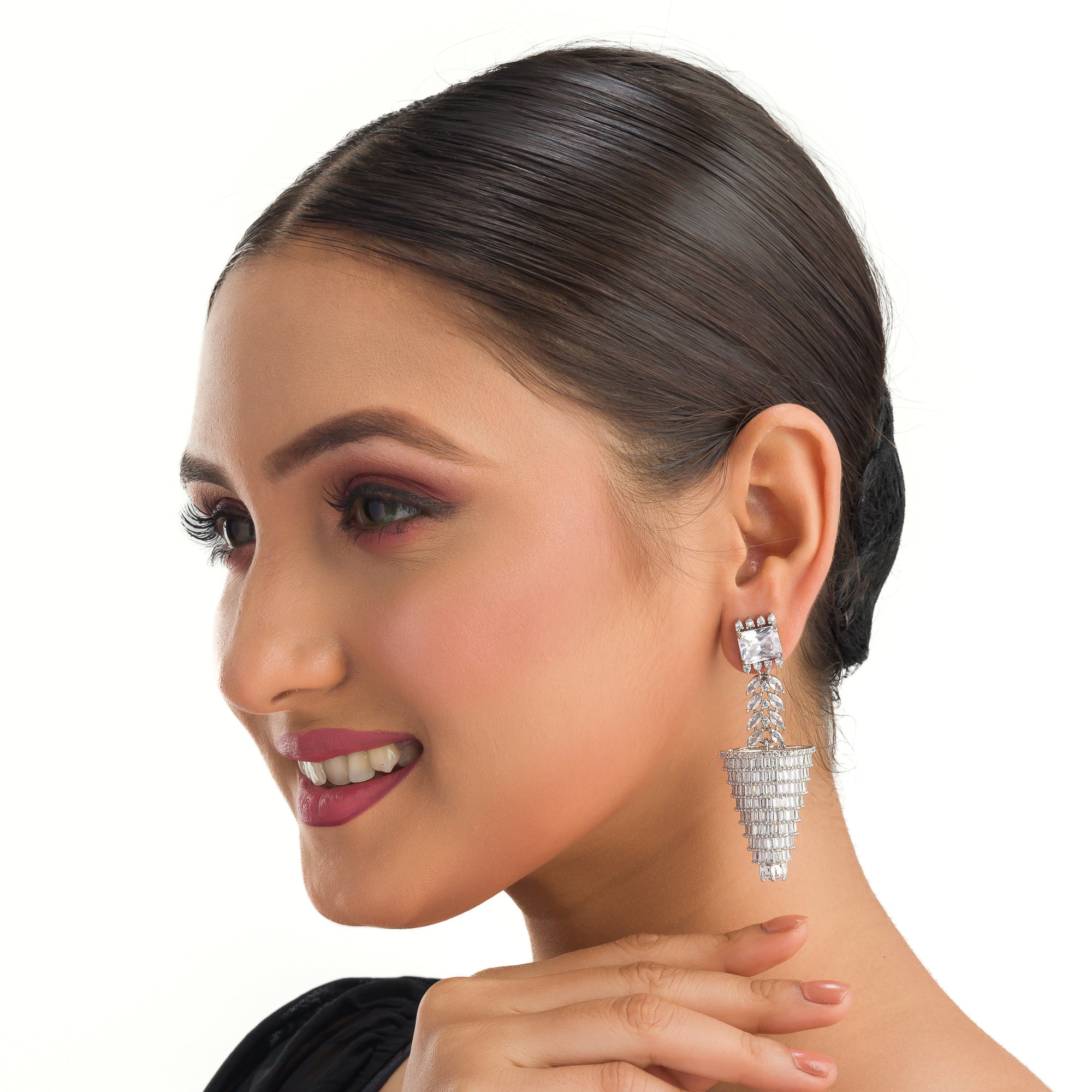 "Graceful long zircon earrings shimmer with timeless sophistication and dazzling elegance."