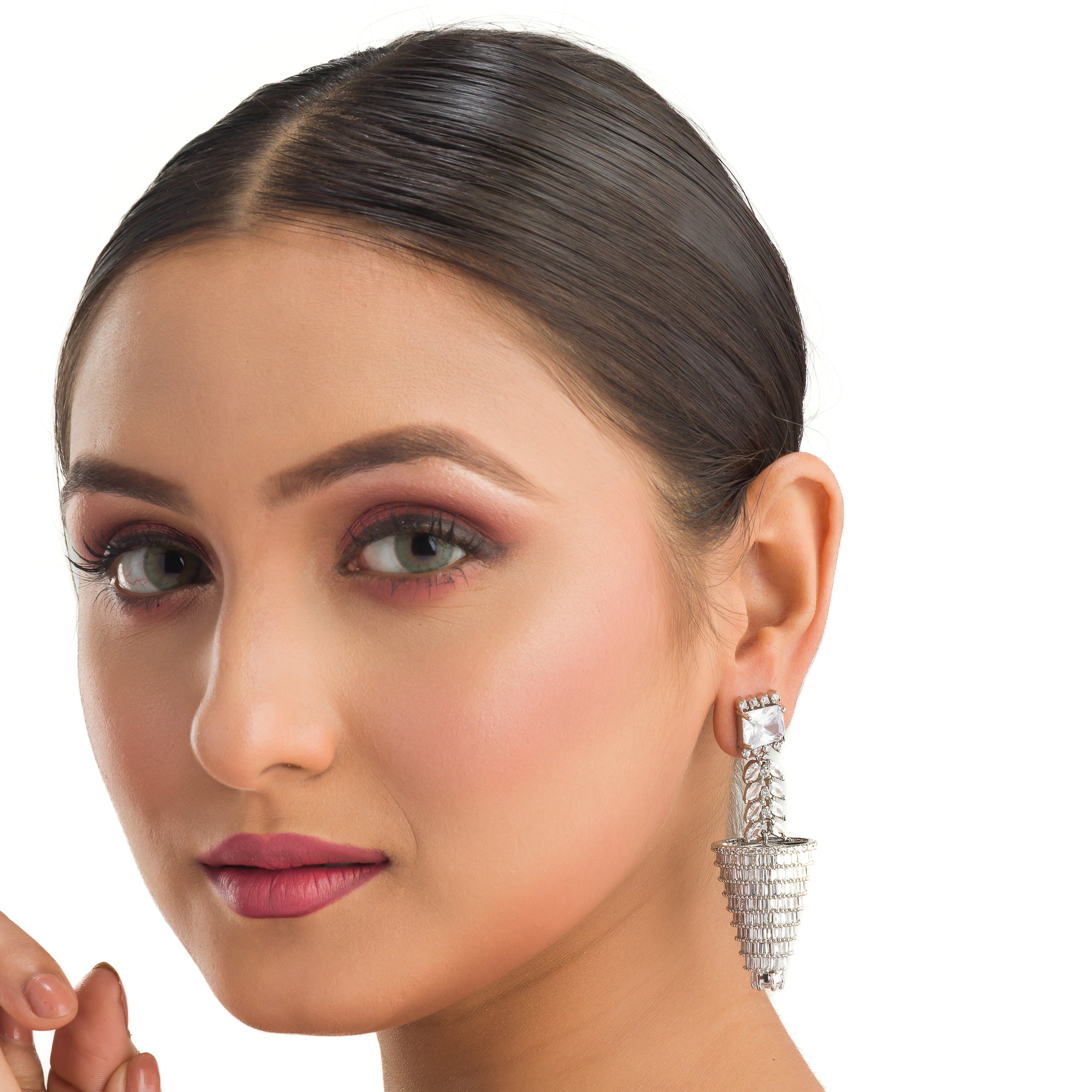 "Graceful long zircon earrings shimmer with timeless sophistication and dazzling elegance."