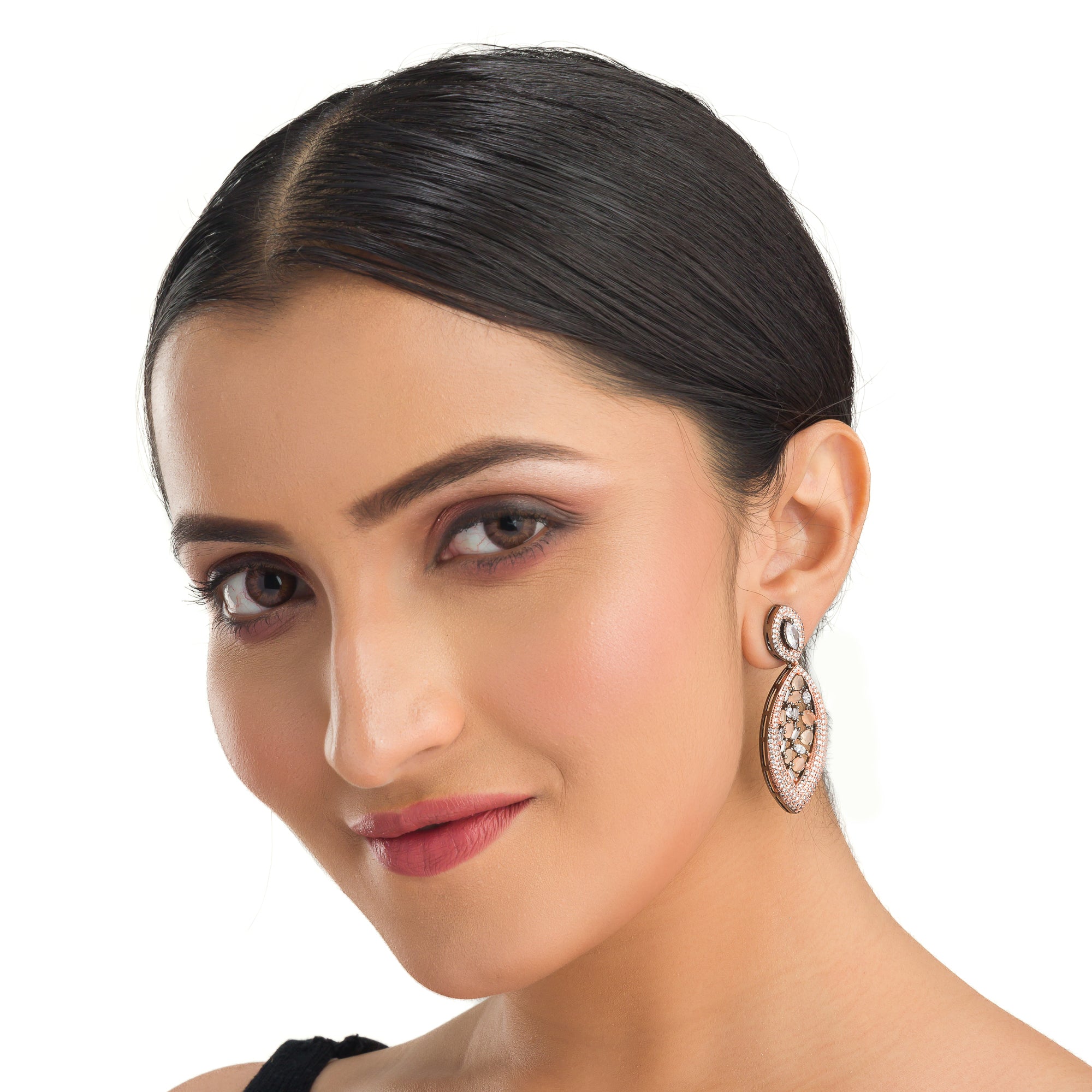 1. "Rose gold earrings with salmon zircon exude warm, radiant charm with sophisticated elegance."