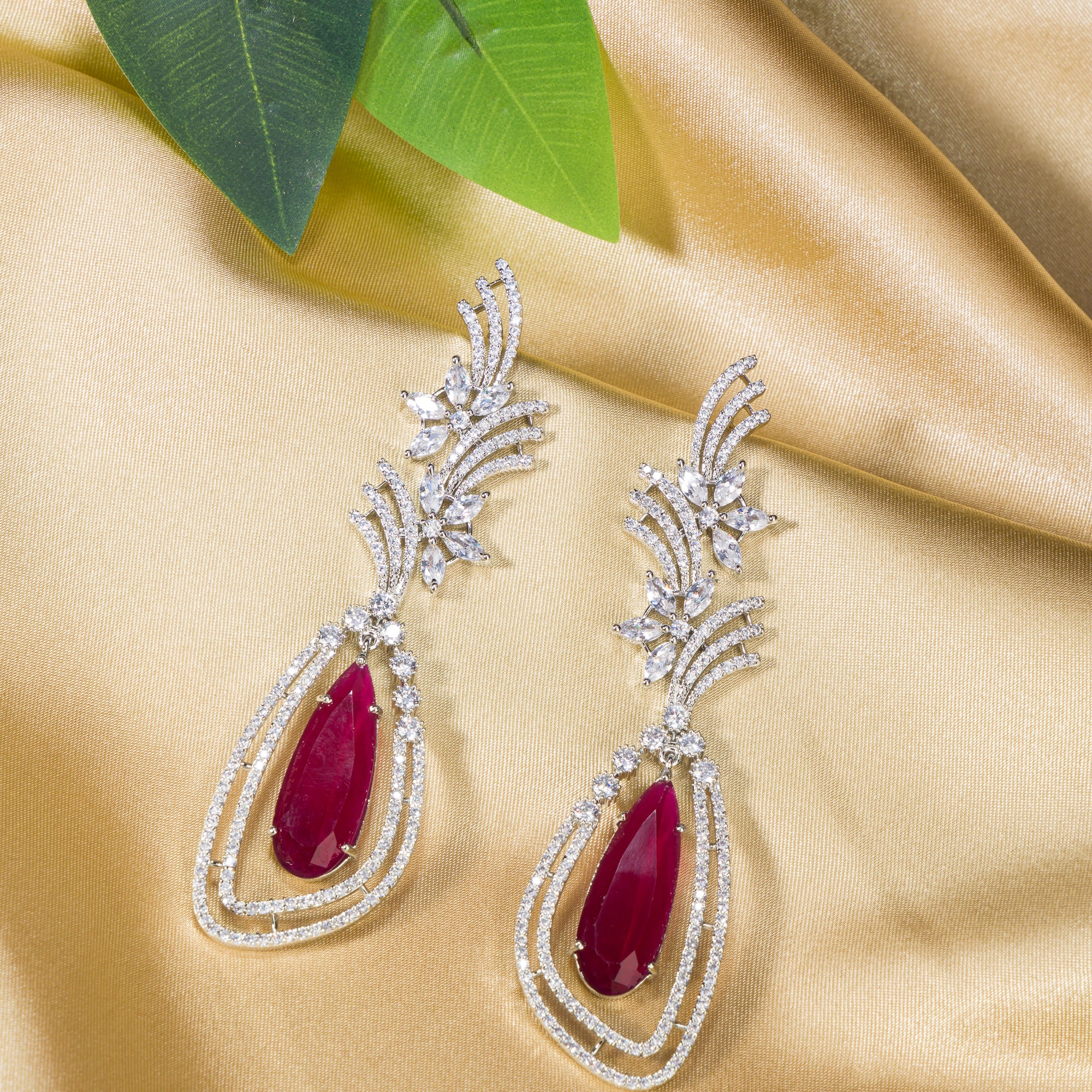 "Light pink zircon earrings offer a delicate sparkle with a serene, elegant touch."