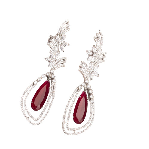 "Light pink zircon earrings offer a delicate sparkle with a serene, elegant touch."