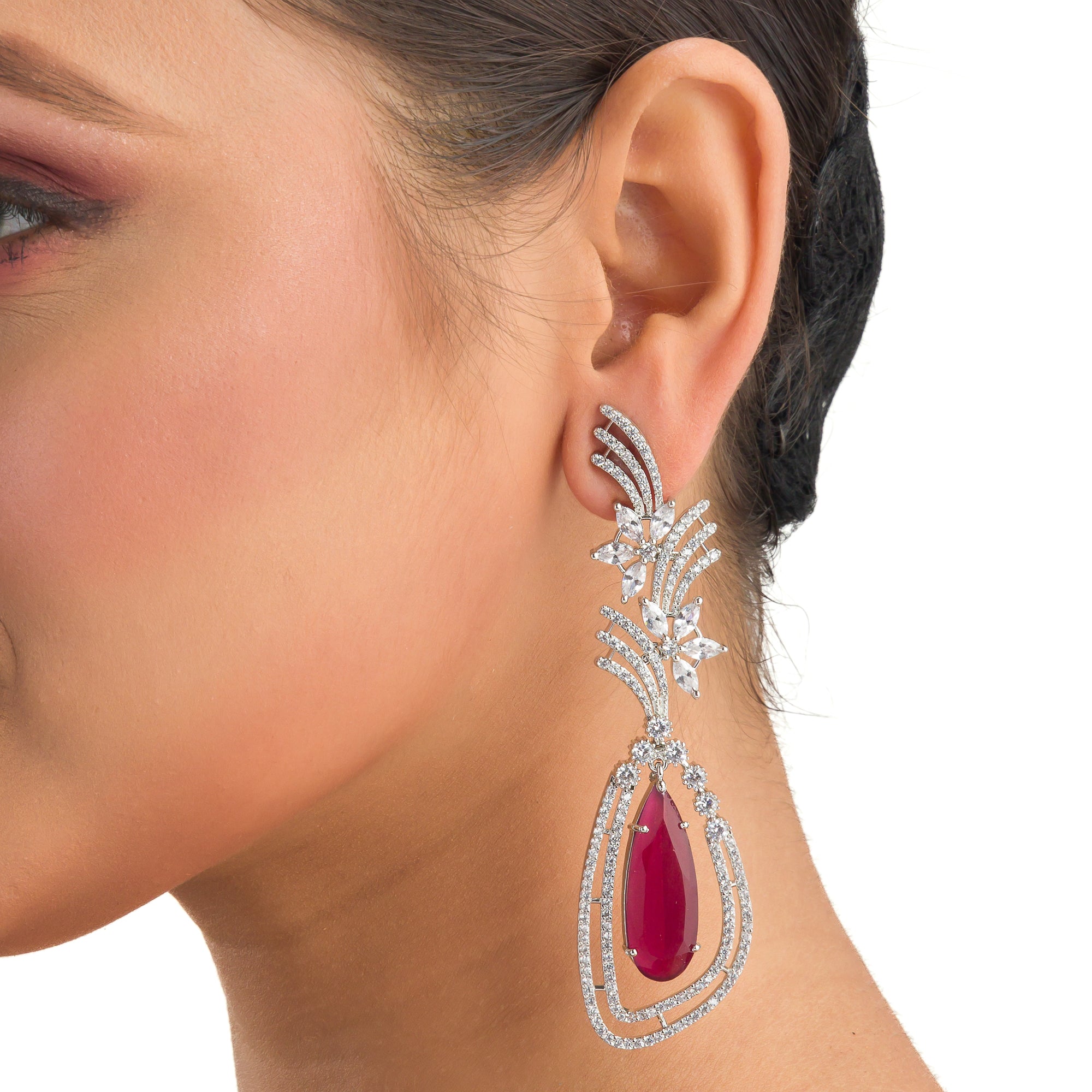 "Light pink zircon earrings offer a delicate sparkle with a serene, elegant touch."