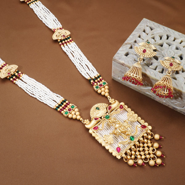 "Long temple necklace with multi-colored pearl beads adds vibrant, sophisticated flair."