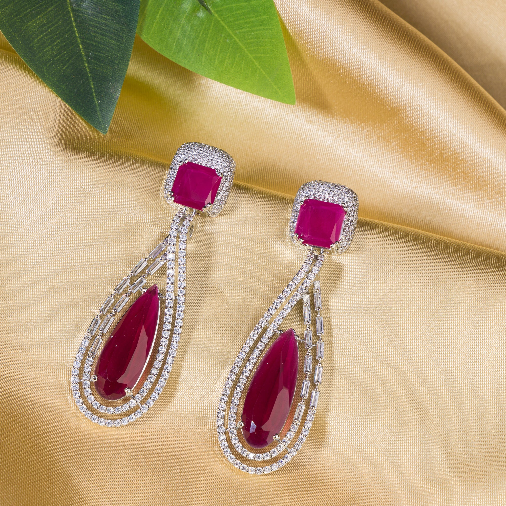 "Light pink zircon earrings offer a fresh, delicate sparkle with serene elegance."