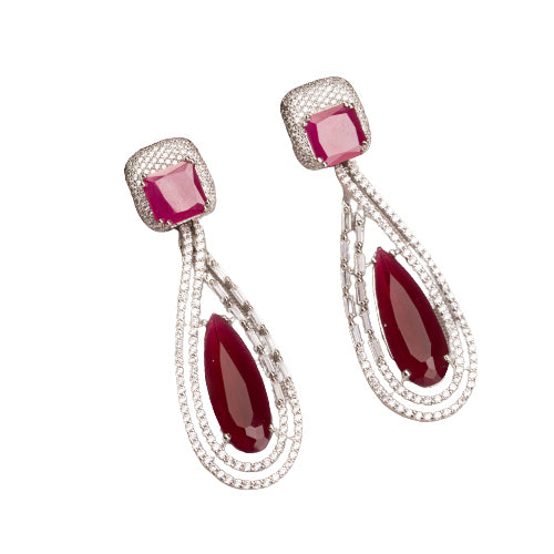 "Light pink zircon earrings offer a fresh, delicate sparkle with serene elegance."