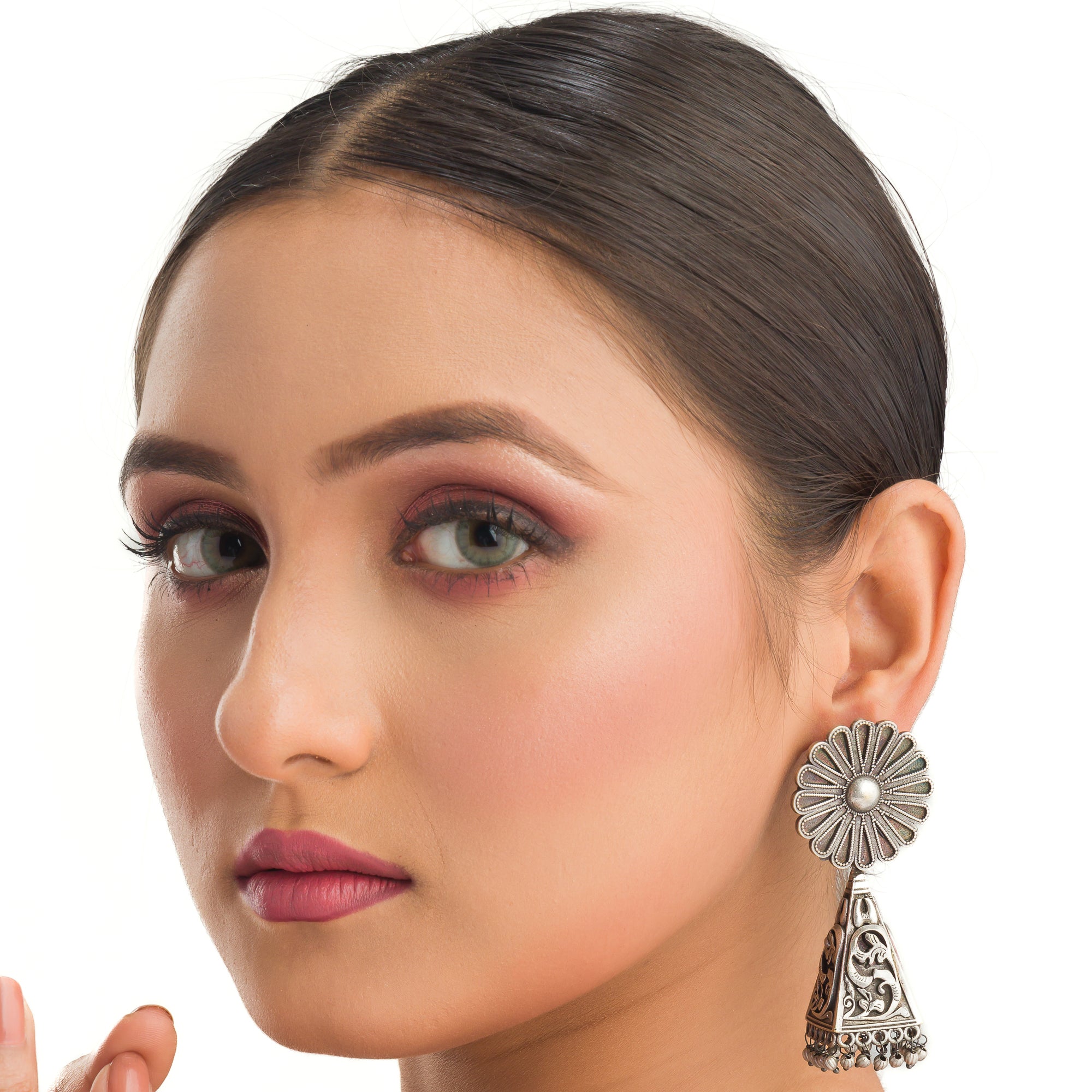 "Trendy oxidized earrings with a sleek, modern edge to elevate any outfit."