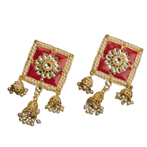 1. "Red square gold jhumka blends bold color and classic elegance for a striking look."