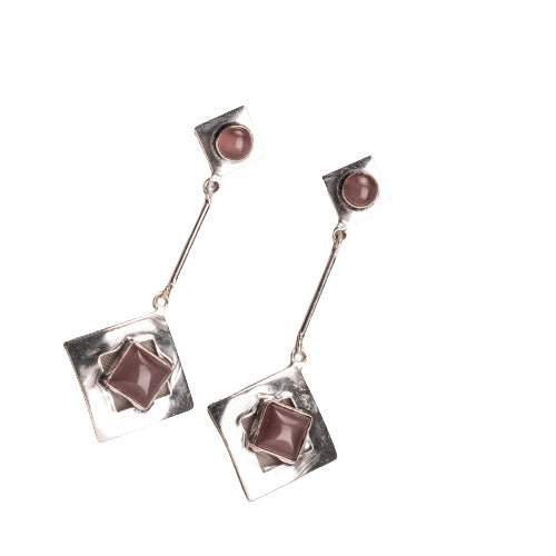"Trendy oxidized metal dangler earrings add a sleek, modern edge to any outfit."