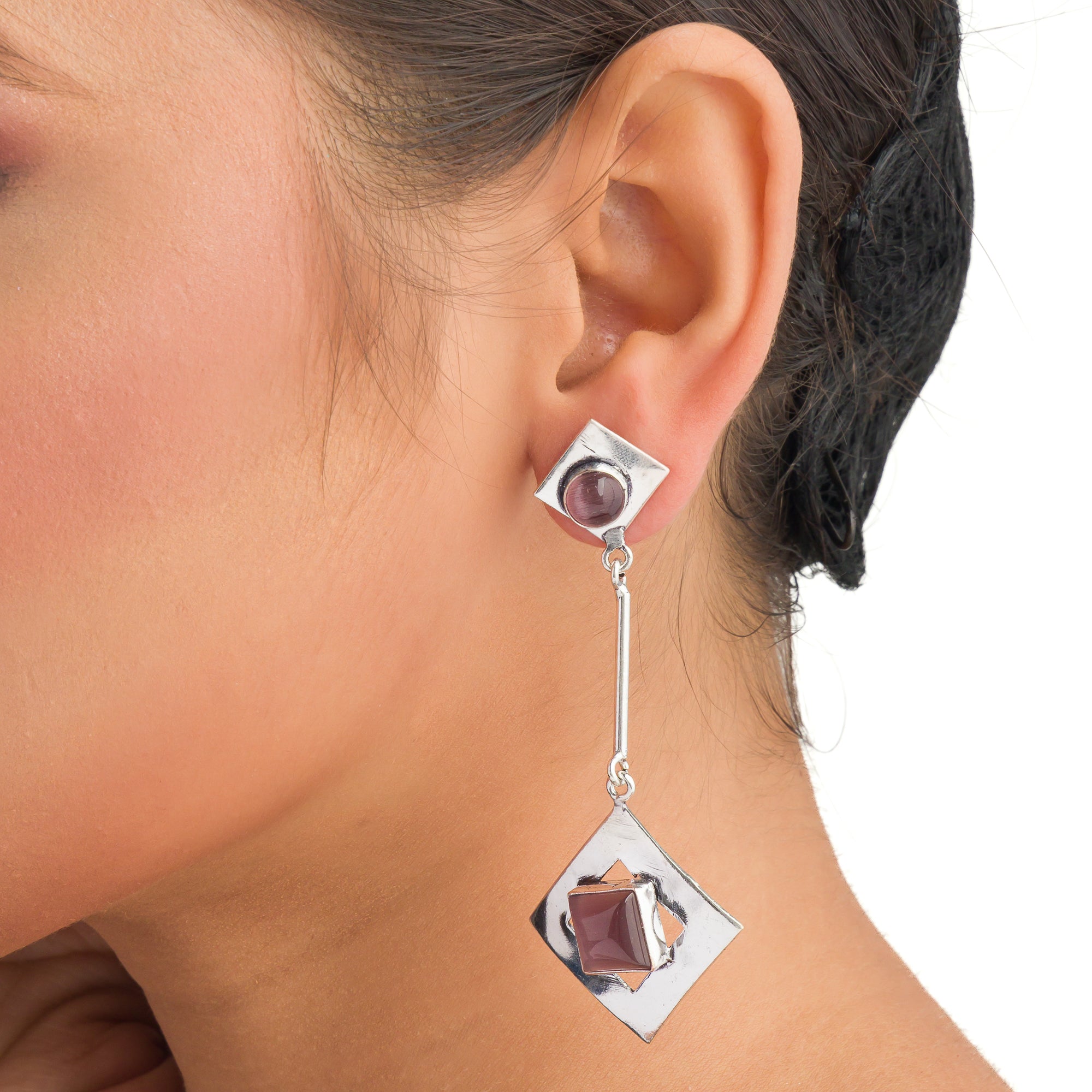 "Trendy oxidized metal dangler earrings add a sleek, modern edge to any outfit."