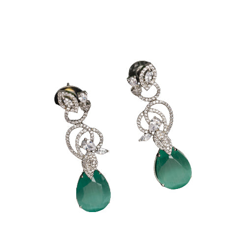 1. "Light green zircon earrings sparkle delicately, adding serene elegance to your look."
