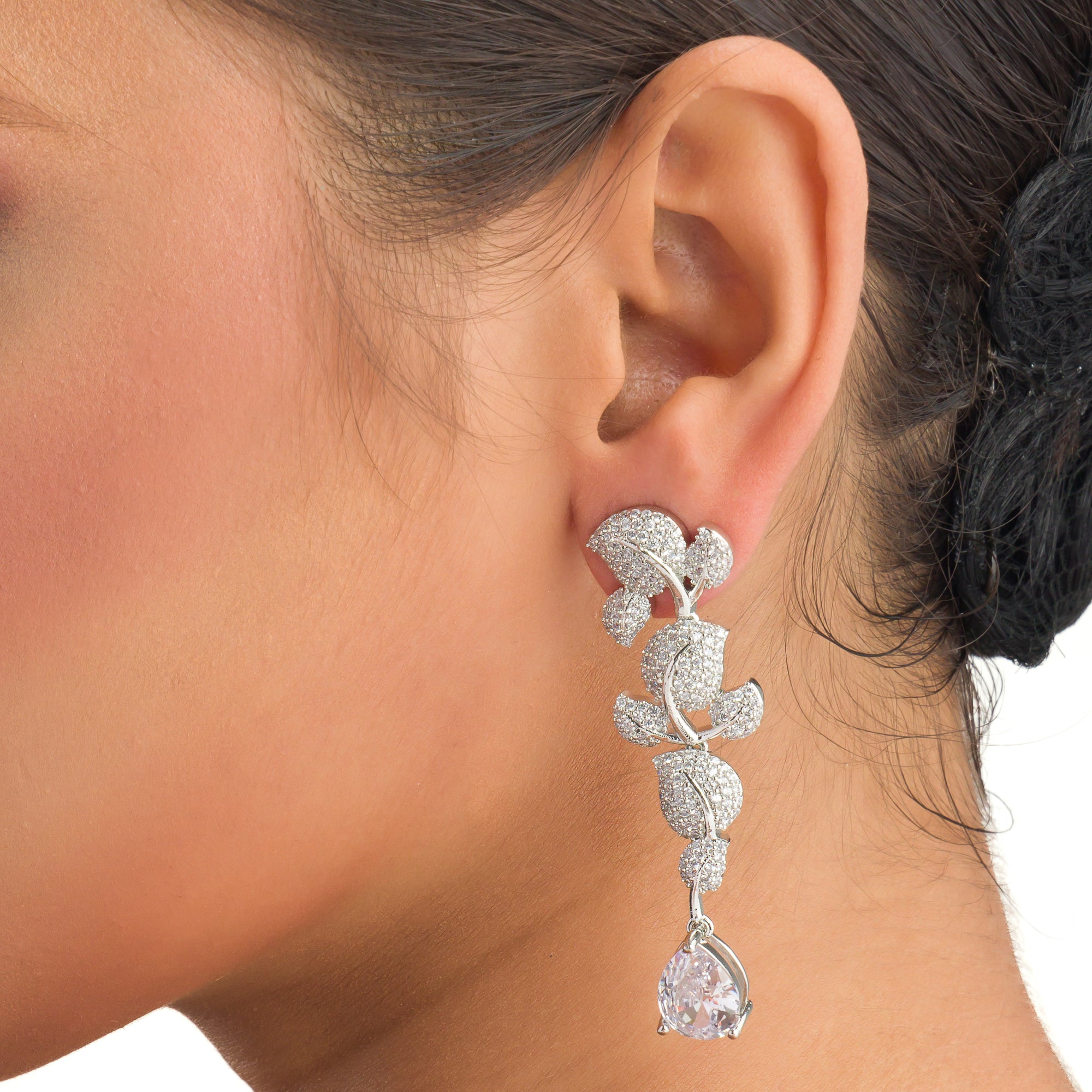 "Leaf design zircon earrings blend natureβs beauty with radiant zircon accents."