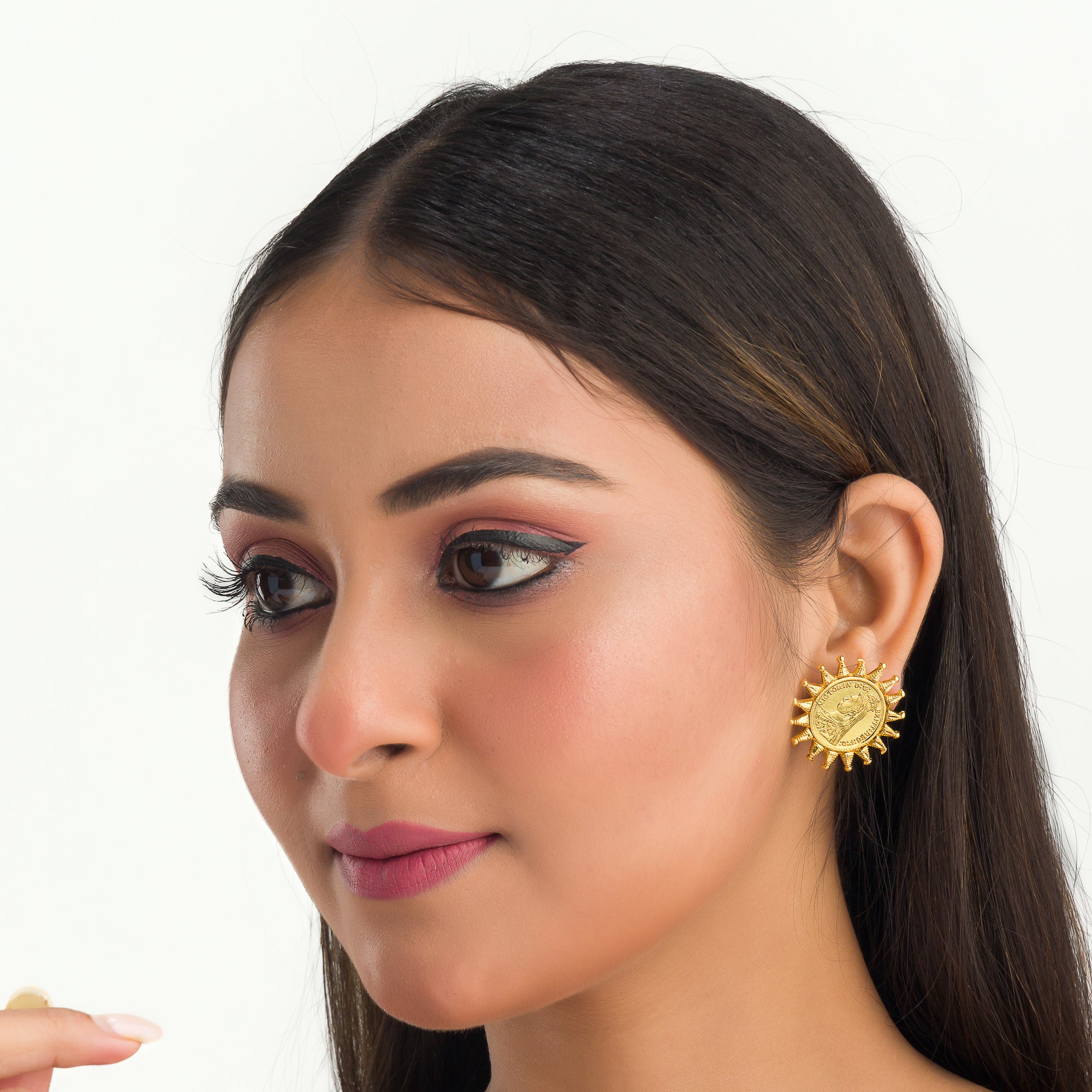 "Sun design Rani Victoria earrings mix regal elegance with timeless classic style."
