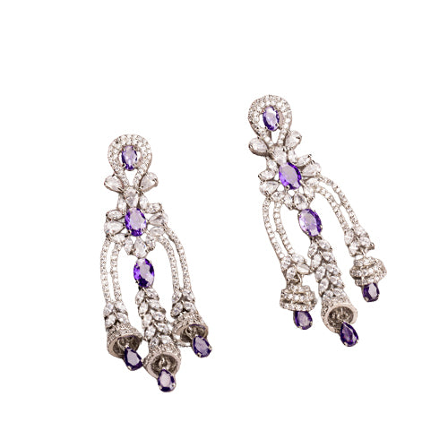 1. "Blue zircon dangler earrings shimmer with a captivating, deep sparkle for a bold look."
