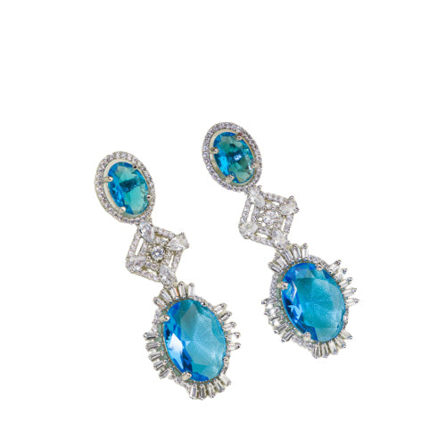 "Blue zircon dangler earrings exude a captivating sparkle, perfect for any party."