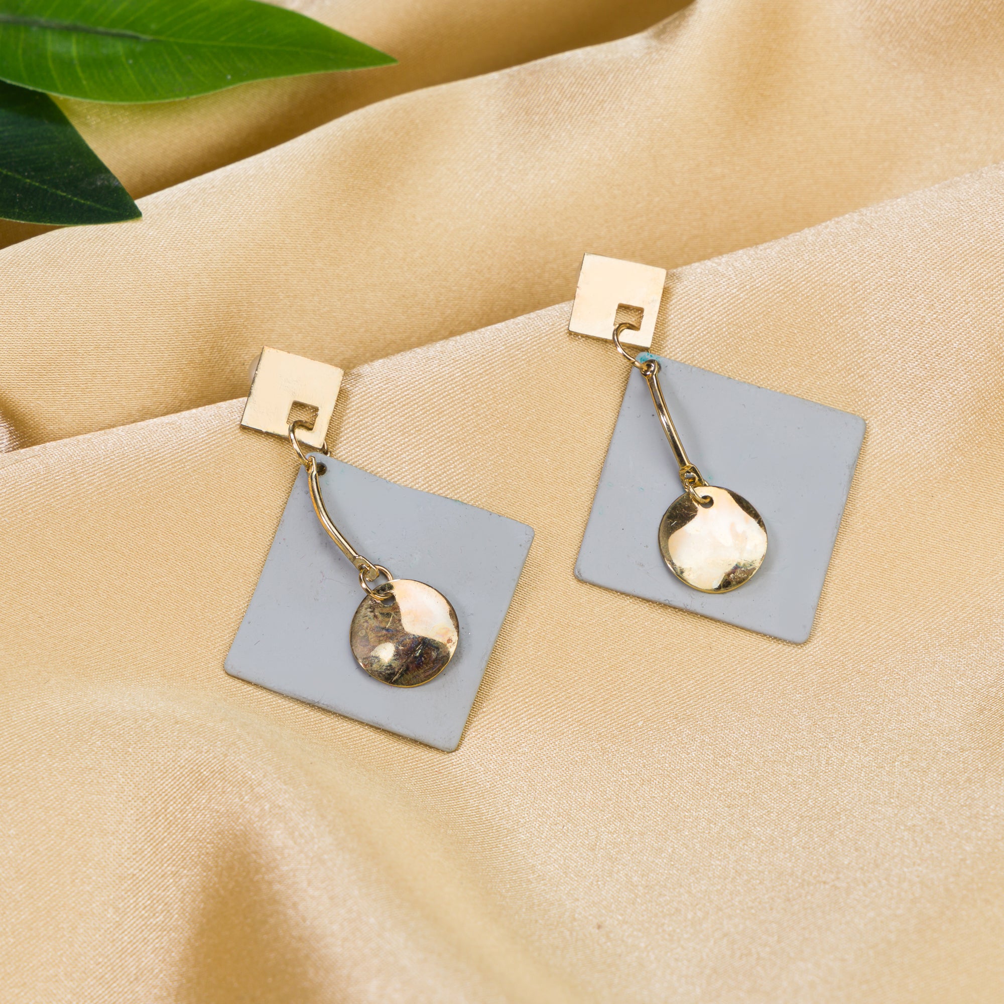 "Small trendy gold-tone hoop earrings perfect for casual everyday wear."