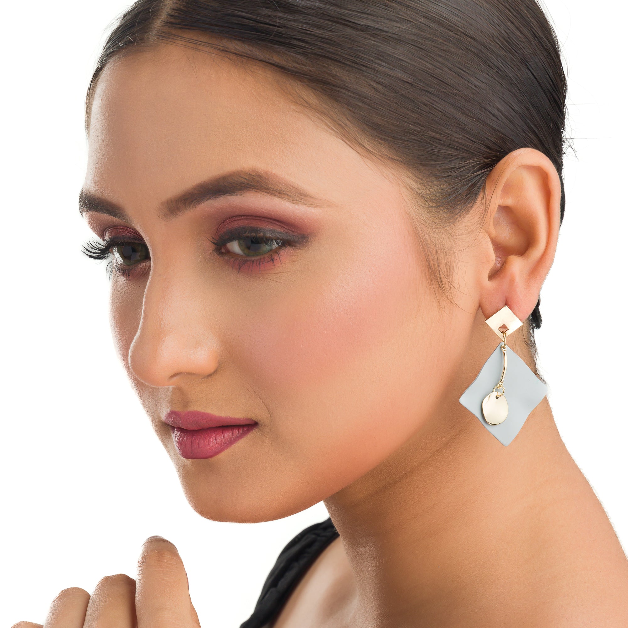 "Small trendy gold-tone hoop earrings perfect for casual everyday wear."