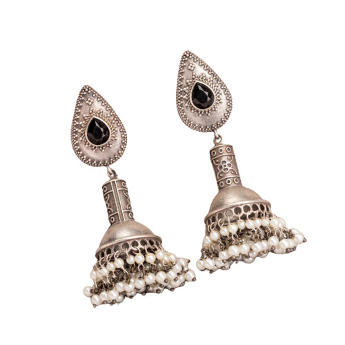 "Oxidized jhumka with black stone delivers a striking vintage allure for a timeless style."