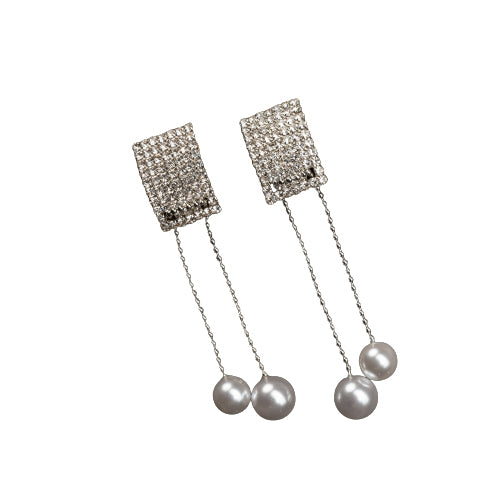 "Silver zircon earrings with hanging pearls offer elegant sparkle and sophistication."